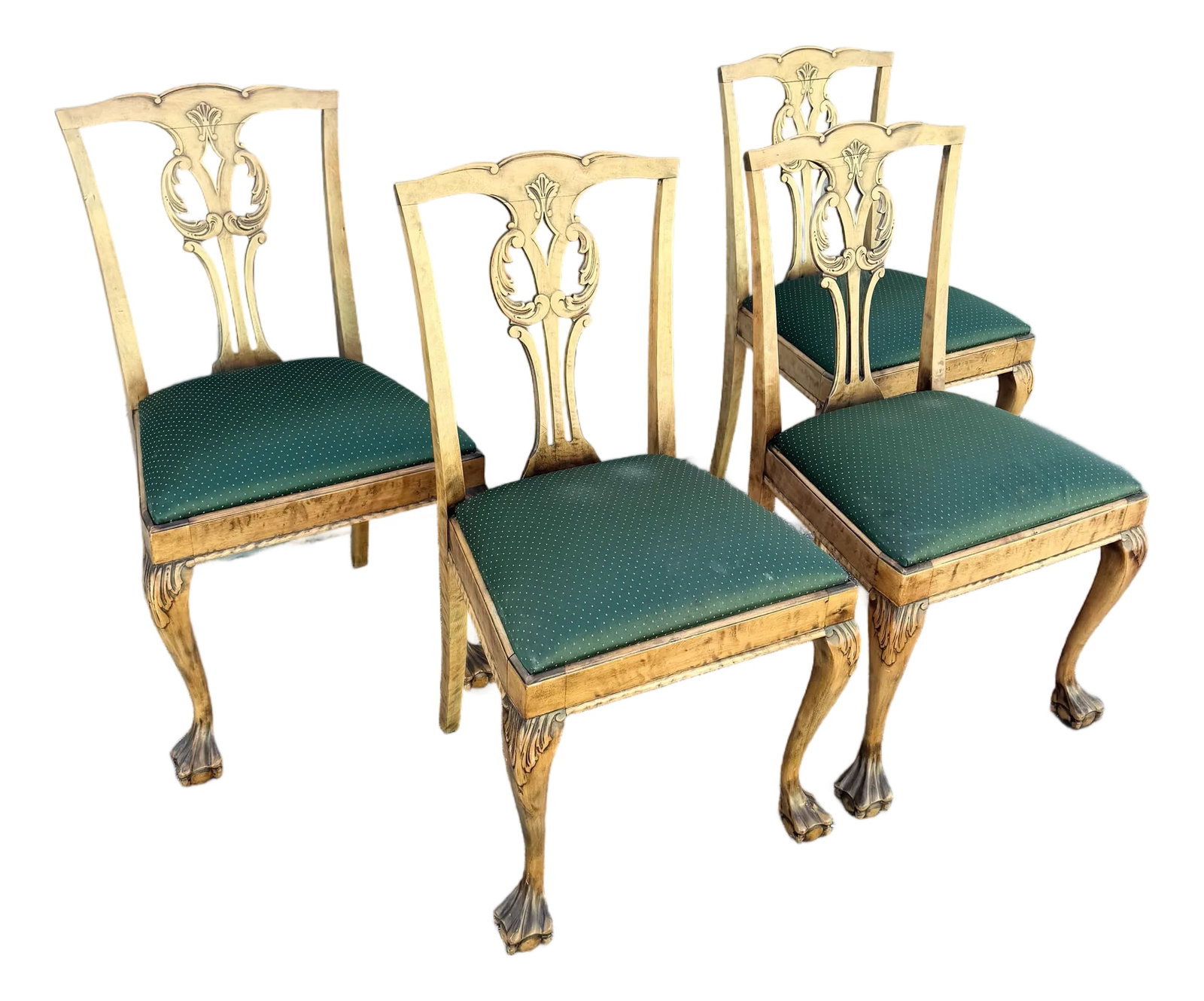 Vintage Chippendale Style Ball in Claw Dining Chairs - Set of 4: A refined set of vintage Chippendale-style dining chairs, showcasing timeless craftsmanship and elegant detailing. Each chair features intricately carved splat backs with classic pierced motifs, frame