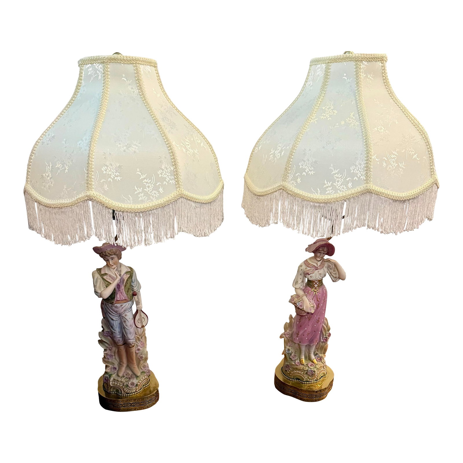 1940s s.g.k. China Pair of Large Lamps: This beautiful pair of bisque porcelain S.G.K. lamps setting on ornate brass basses were produced in Occupied Japan, during 1945 - 1952. The intricate hand-painting on the figurines, particularly the 