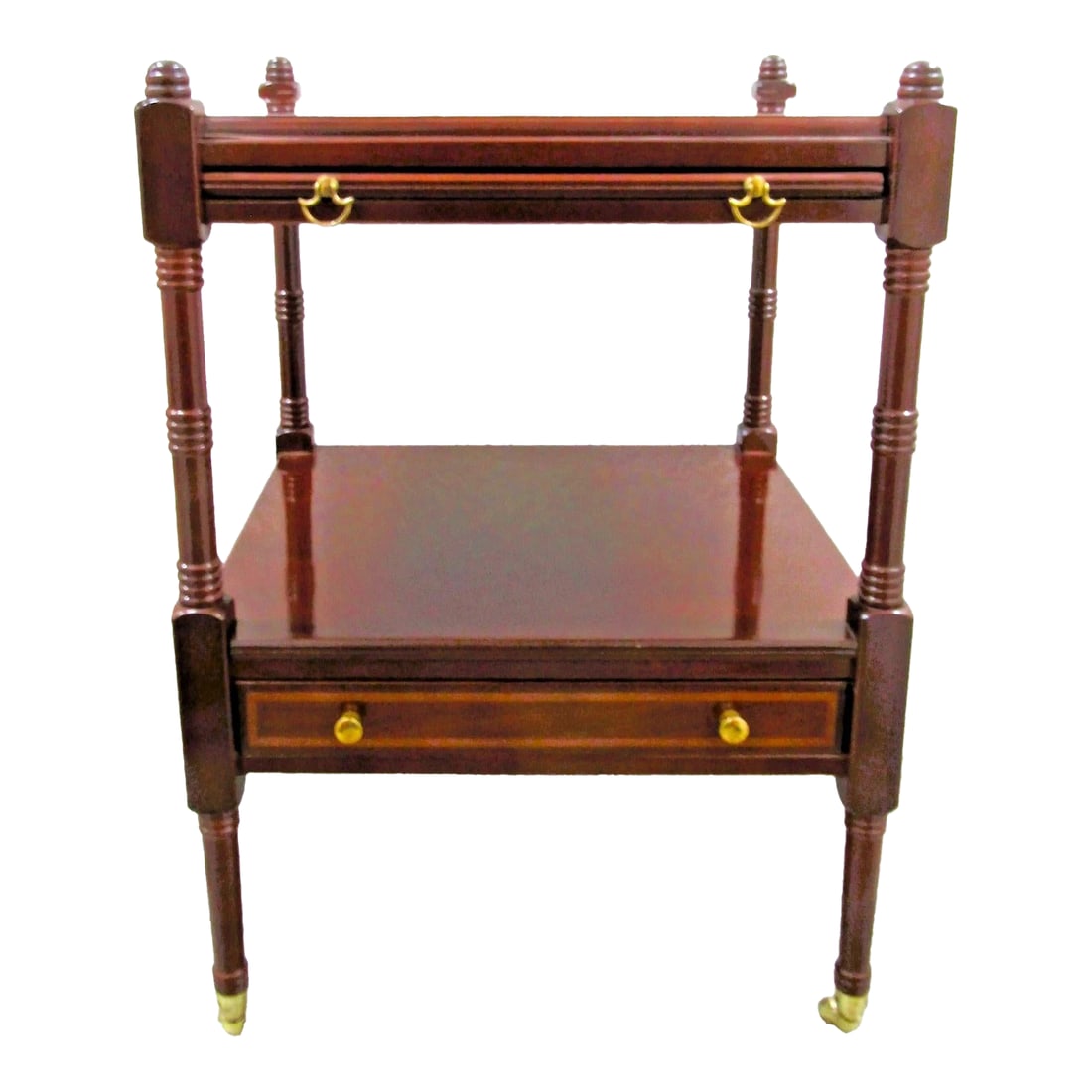 1980s Bombay Regency Style Cherry Finish Two Tier Side End Table: This 1980s Bombay Regency Style Cherry Finish Two Tier Side End Table is a stylish and functional piece of furniture for any home. Made of wood with brass hardware, this rectangular table features a