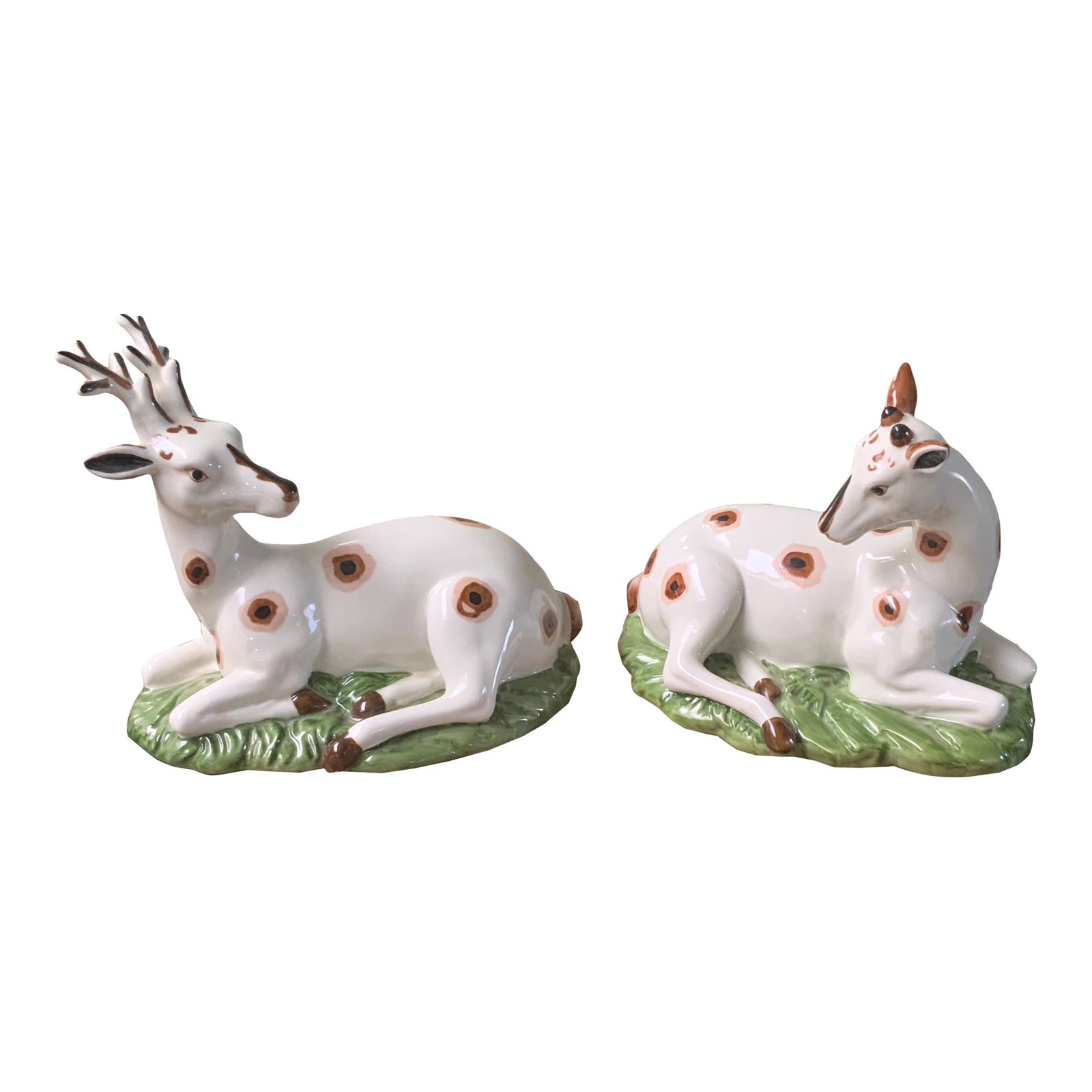 1980s Pair of Porcelain Recumbent Deer: Wonderful Pair Of Porcelain Figures of a Recumbent Antlered Stag Deer and Doe. Finely Cast and Colorfully Glazed Porcelain. Made For Williamsburg Museum by Global View Condition: Alterations: