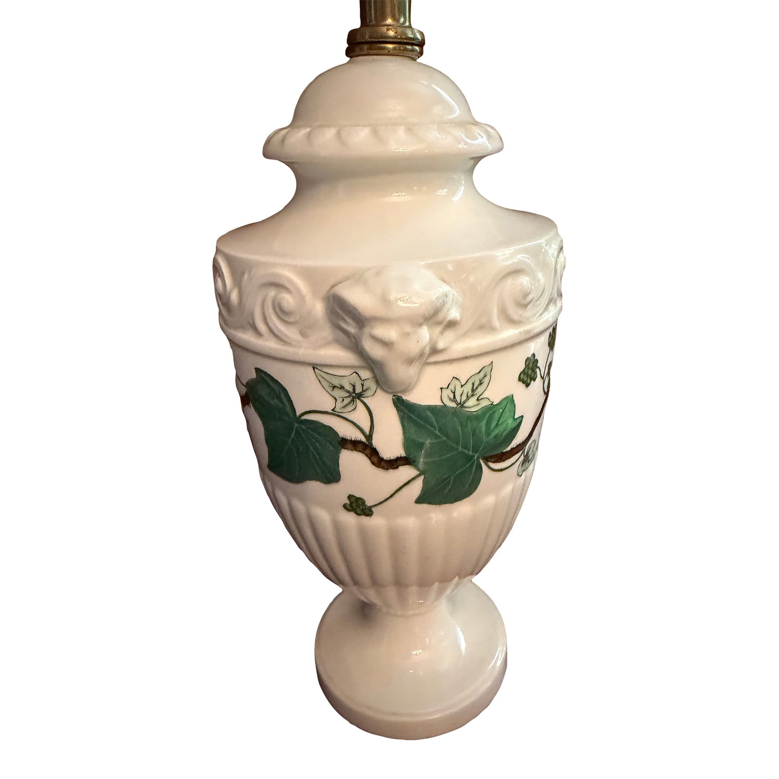 Wedgwood Napoleon Ivy Porcelain Table Lamp Ram's Head ca.1960s: The Wedgwood Napoleon Ivy Porcelain Table Lamp from the 1960s is a vintage piece with a charming design that features a ram's head. The white porcelain material and white light color add a touch of el