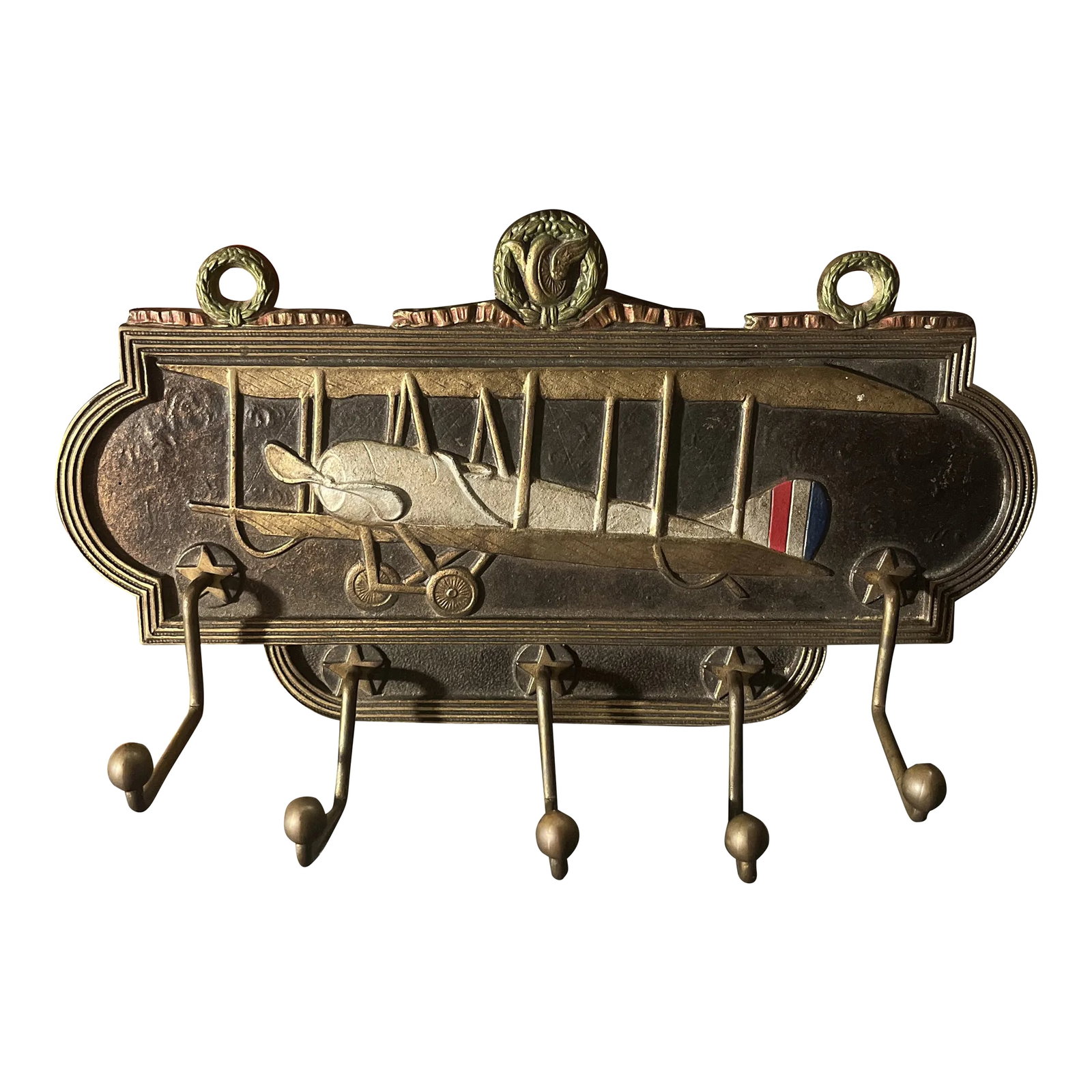Antique Judd Co. Cast Iron Airplane Themed Wall Rack: Solid and unique piece with great color and detail. I especially like the three scrolls at top, two of which would be used for hanging purposes. Also, the stars at the base of each hook is a nice touc