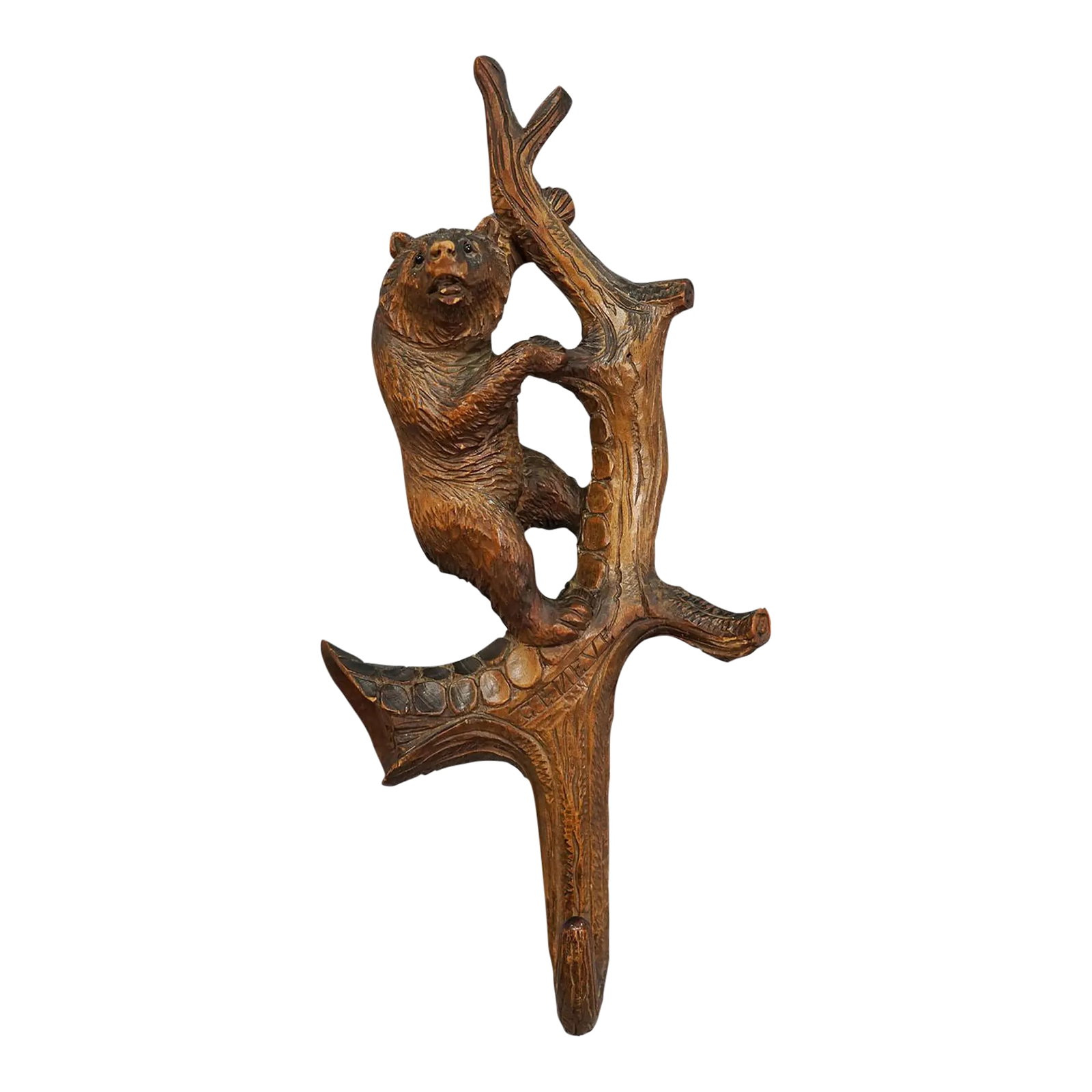 Lovely Black Forest Carved Whip Holder With Bear Ca. 1900s: Lovely Black Forest Carved Whip Holder with Bear ca. 1900s A very rare hand-carved coat hook or whip holder depicting a bear klimbing on a three. Hand carved in Brienz, Switzerland, around 1900, this 