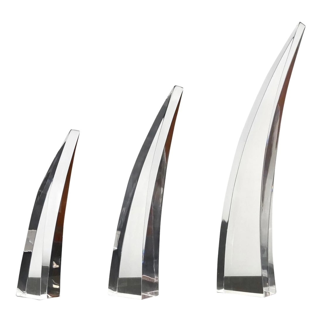1960's Mid-Century Modern Lucite Sculptures - Set of Three: Vintage 1960's Midcentury Modern sculptures for sale. They were designed by Herb Ritts for Astrolite, and are in excellent condition. It comes with three solid thick lucite curved abstract
