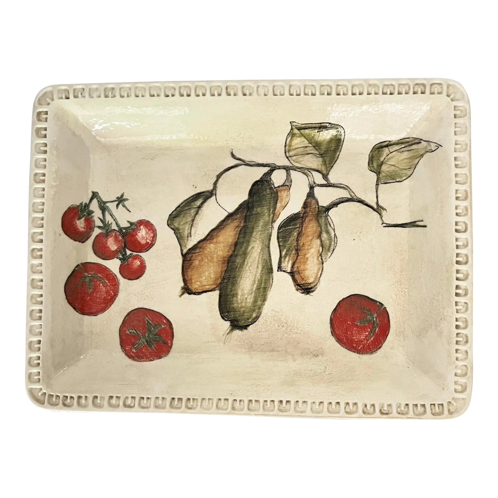 Williams-Sonoma Italian Large Tomato/Zucchini Pattern Platter / Serving Bowl: Williams-Sonoma serving bowl / platter with tomato and zucchini design. Painted to look like chalk paintings finished with an aged look glaze. Made in Italy. Measures 18.75" w x 14.25" d x 2.5" h.