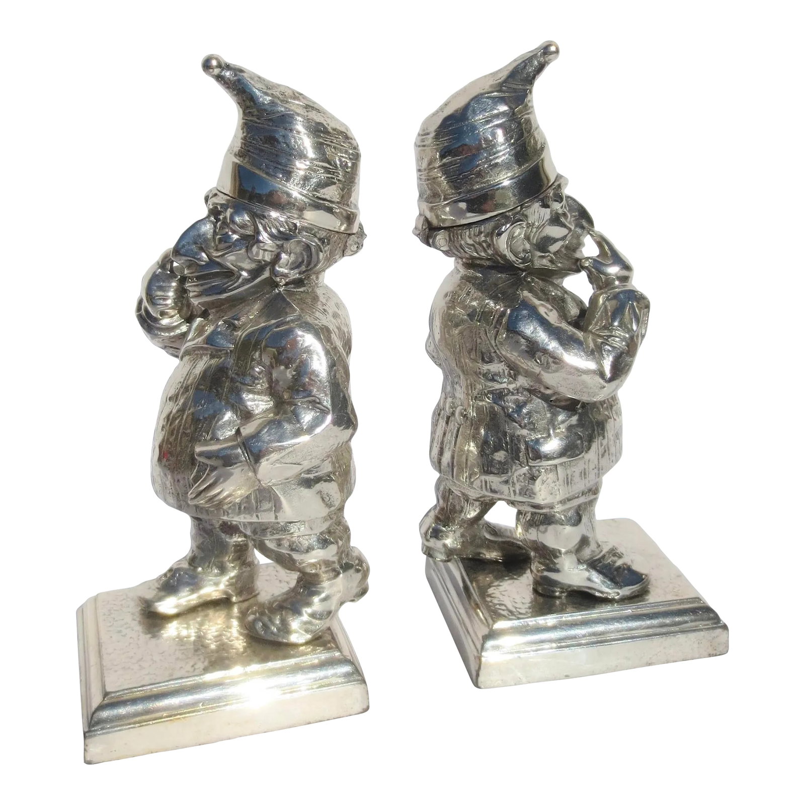 Mr. Punch Lighters Silverplate Circa 1900 -A Pair of Two: Matching pair of Punch lighters. Puppet character with trademark features. Favorite character Punch with a flip-top hat concealing a lighter mechanism, The lighter screws out to allow fuel. marked