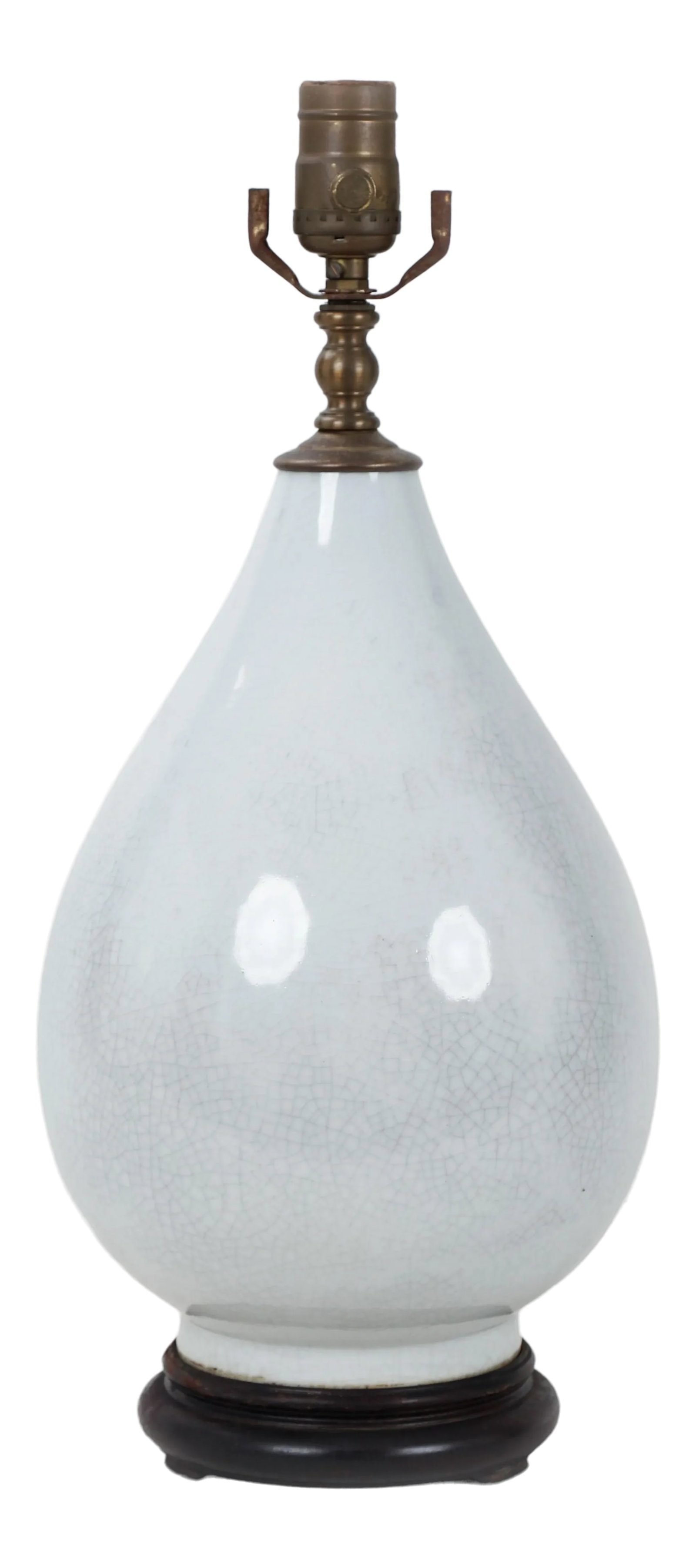 1980s Traditional Teardrop Blanc De Chine Porcelain White Crackle Vase: Tear drop shaped white porcelain vase lamp. This vase lamp appears luminescent due to the bright white color and features a crackle finish. Dehua porcelain, more traditionally known in the West as