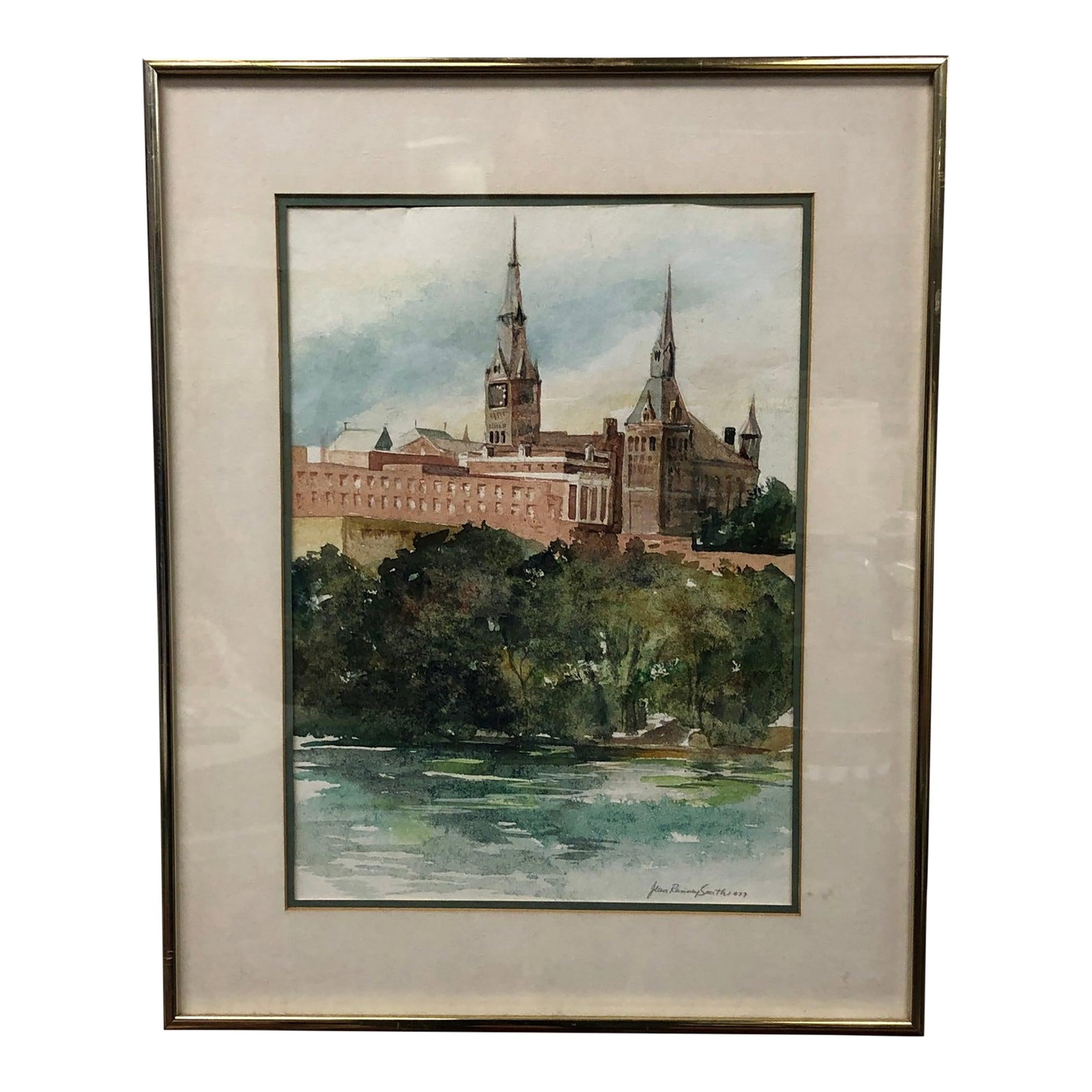 Georgetown University by Jean Ranney Smith - Original Watercolor 1977 Signed, Framed: This original 1977 watercolor by Jean Ranney Smith captures the historic and architectural elegance of Georgetown University in Washington, D.C. Painted from a scenic vantage across the Potomac River,
