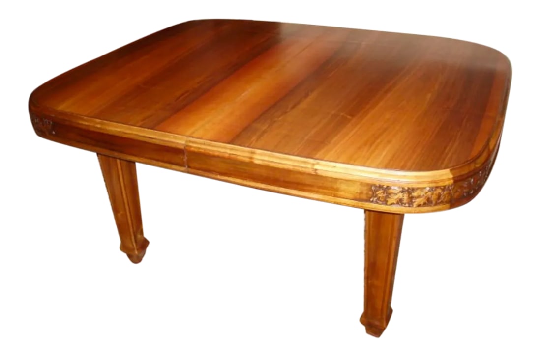 French Art Nouveau Walnut Dining Table: Art Nouveau walnut extension dining table in "La Vigne" pattern by Louis Majorelle, Paris ,circa 1910's. There are four matching chairs available. https://www.chairish.com/product/2323168/french-art-n
