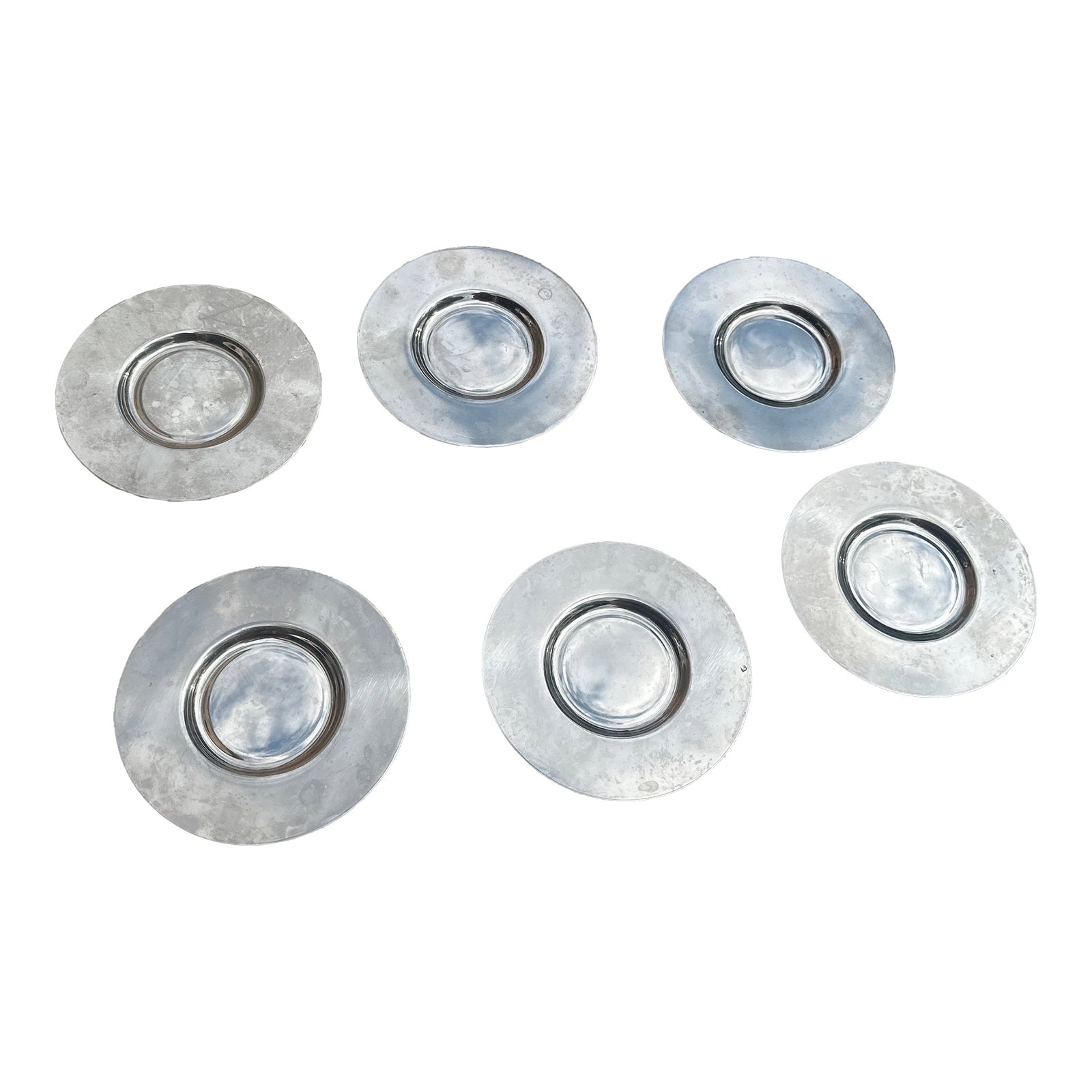 1970s Collection of Simple Silver Saucers- Set of 6: Up for consideration is a beautiful collection of silver saucers. These would look lovely in your home and they are a great find for the interior design enthusiast. Please check out my other