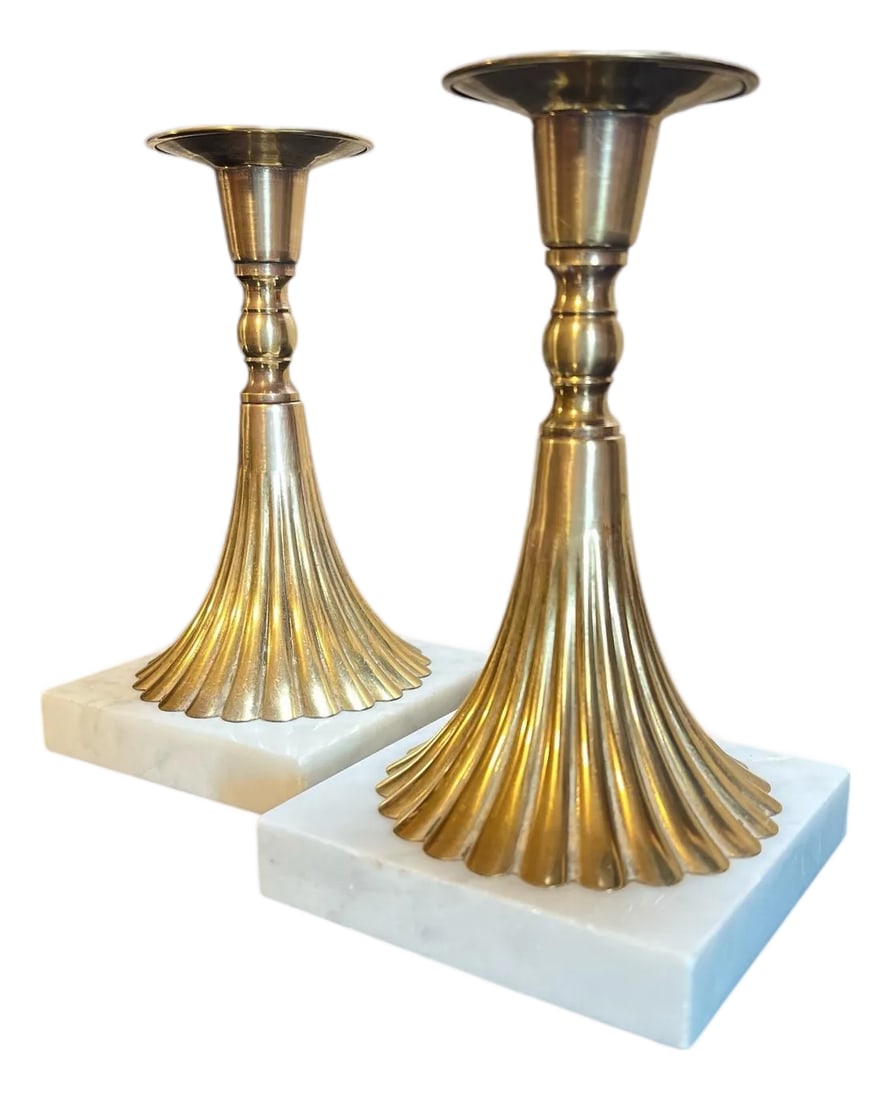 Mid Century Brass and Marble Torchiere Candleholders - A Pair: Offering a pair of Mid Century fluted brass and carrera marble candleholders. Elegant design perfect for taper candles. Each measures 4" square x 7.25" h. Normal imperfections consistent with age and