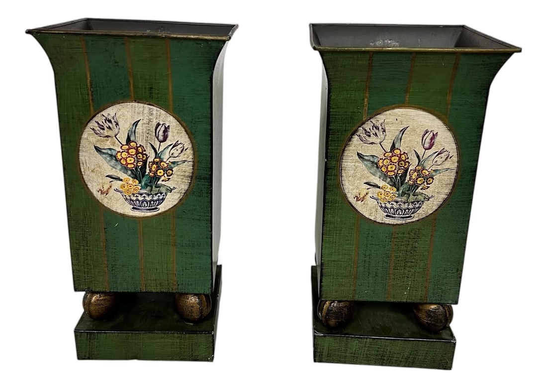 Vintage Metal Tole Vases - A Pair: Create a bright spot with this pair of vintage metal tole cache pots. The floral arrangement set in a chinoiserie blue and white bowl is set on a gold striped green background. Ball feet on a square p