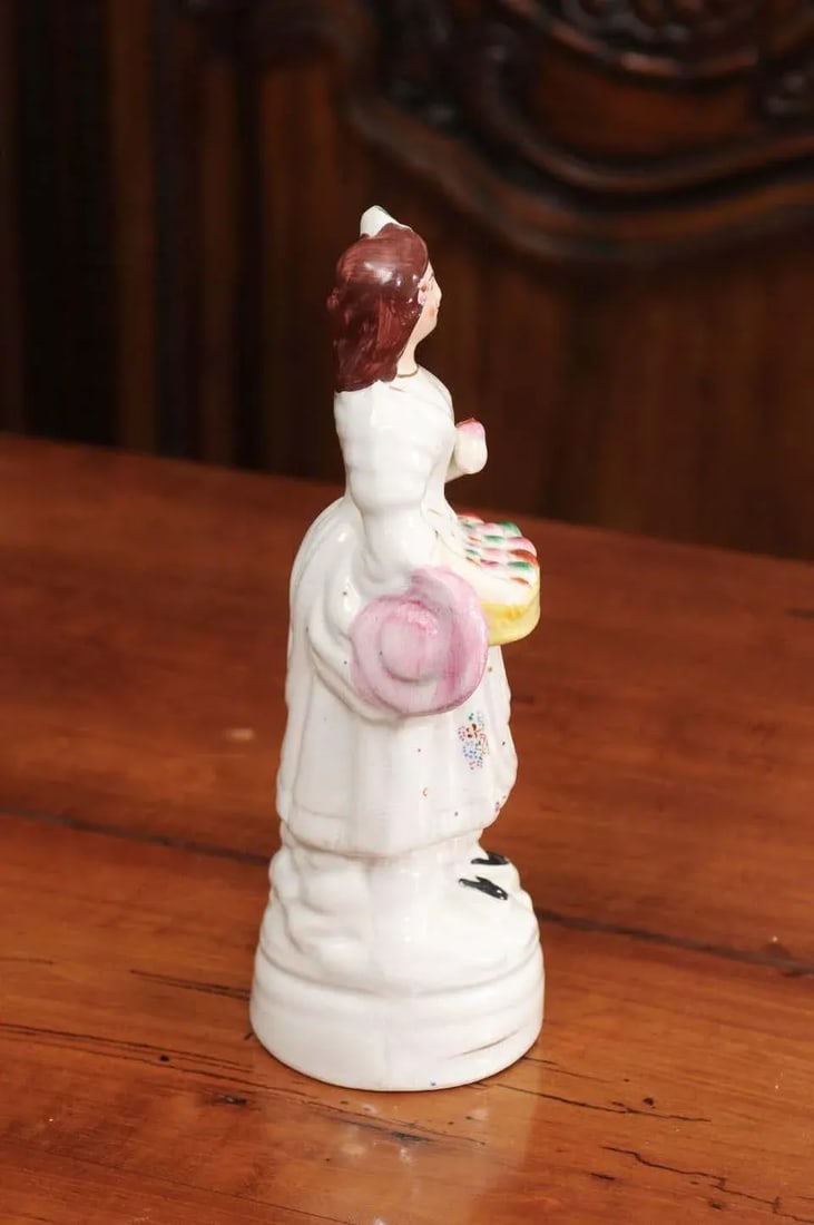 Early 20th Century English Porcelain Decorative Object Depicting Lady With a Floral Basket - 4