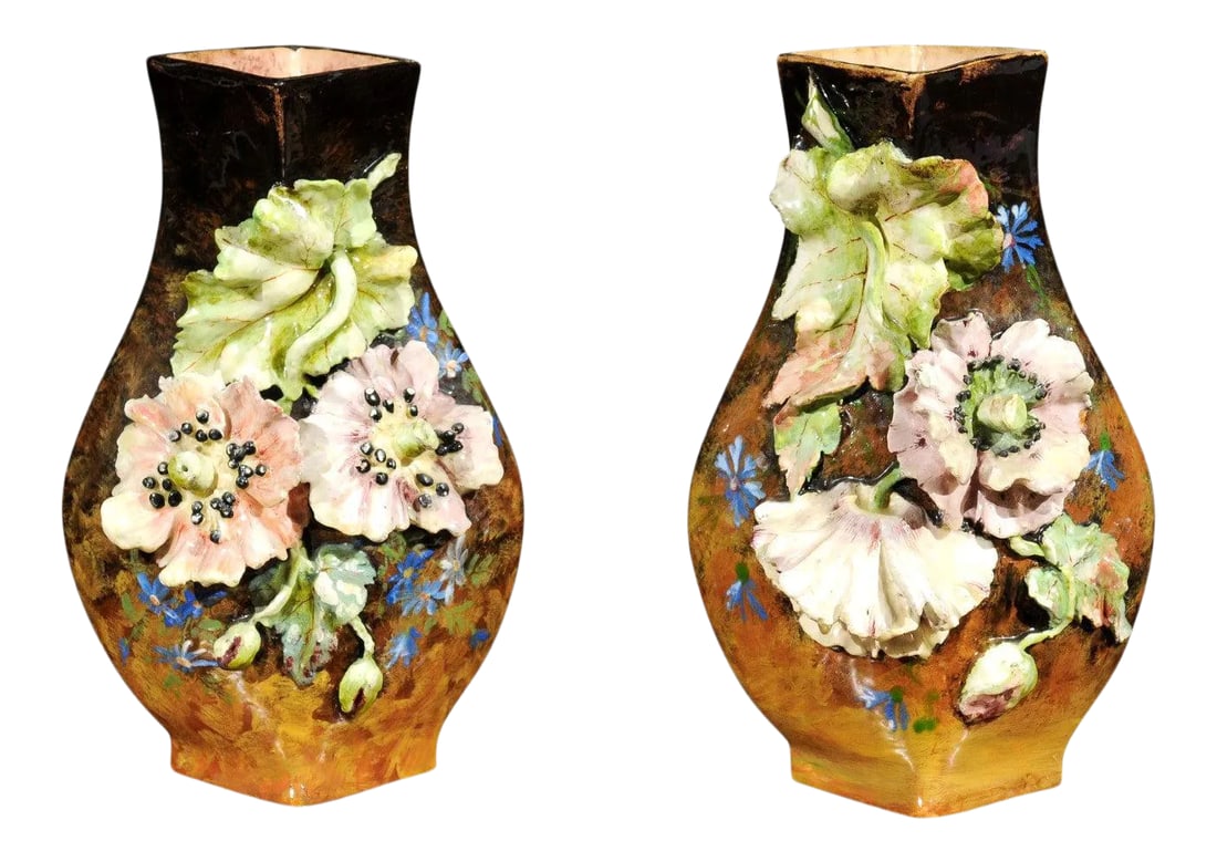 19th Century French Vases with Barbotine Décor of Flowers and Leaves - A Pair: A pair of French faÃ¯ence vases from the 19th century, adorned with a barbotine décor of applied flowers and leaves. Born in France during the 19th century, each of this pair of vases