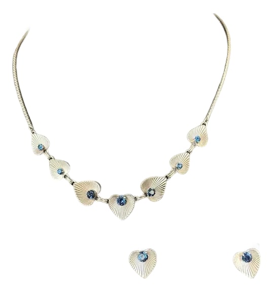 1970sVan Dell Sterling Earrings and Necklace, 3 Pieces: Van Dell sterling demi-parure. Necklace and screw back earrings. Both feature a textured heart/leaf design, accented with blue rhinestones. Necklace has seven of the leaves oriented in different
