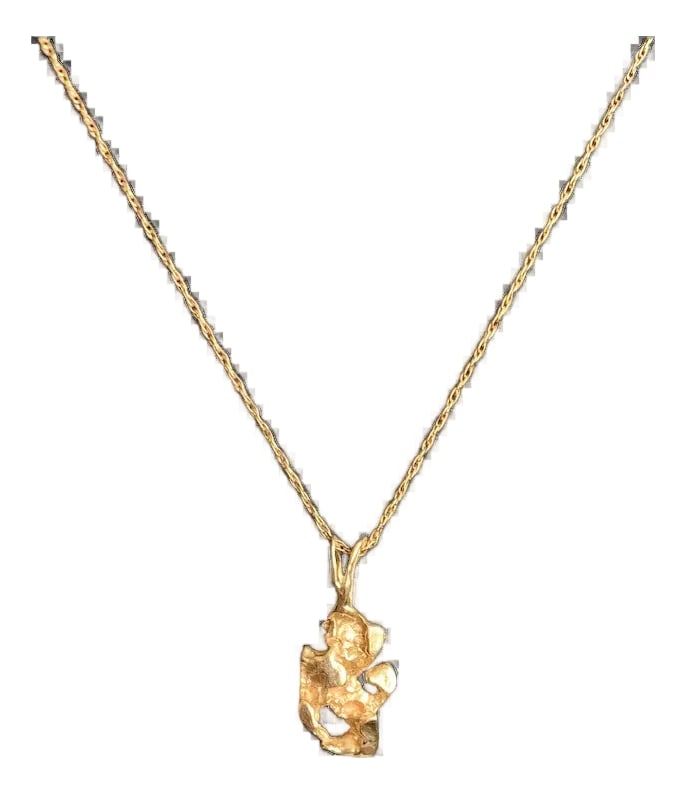 1970s 14k Gold Nugget Pendant: 14k gold nugget pendant from the 70s. Pendant features a large built in bail that will accomodate various sizes of chains. Bail is completely closed and part of the pendant, so no need to worry about