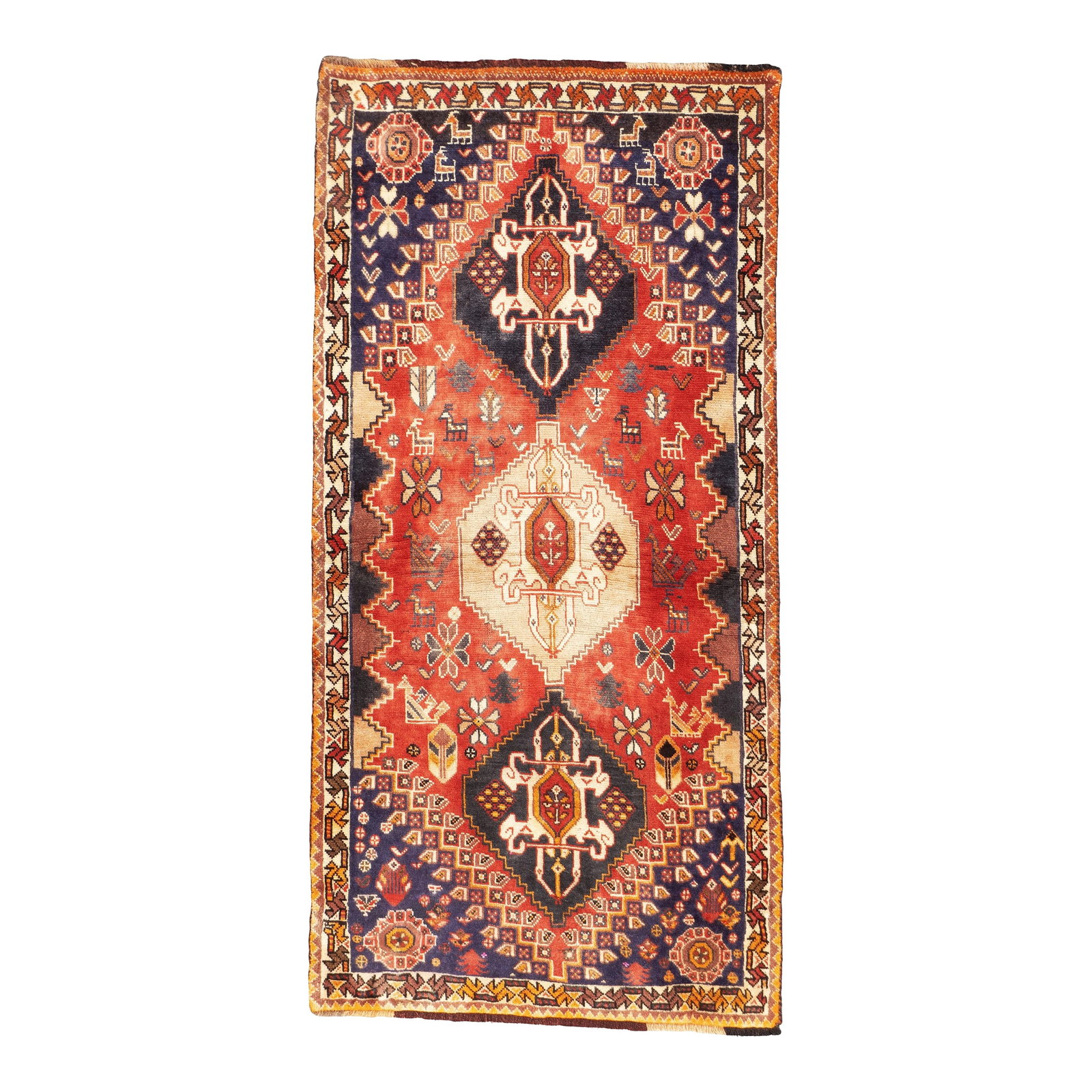 1970s Hand-Knotted Persian Qashqai Rug 2'8" X 5'4": Hand-knotted Persian Qashqai rug, circa 1970. The rug has three diamond-shaped medallions aligned vertically within a geometric field containing stylized animal and floral motifs. Bordered by