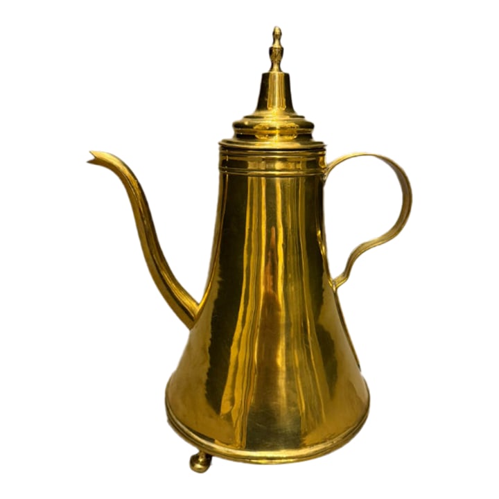 19th Century Dutch Brass Coffee Pot With Turned Legs: 19th century Dutch coffee pot in brass. Handmade with three delicate turned legs and elegant lines, the form features a small top and lid tapering down to a wide base. The piece is finished with a sle