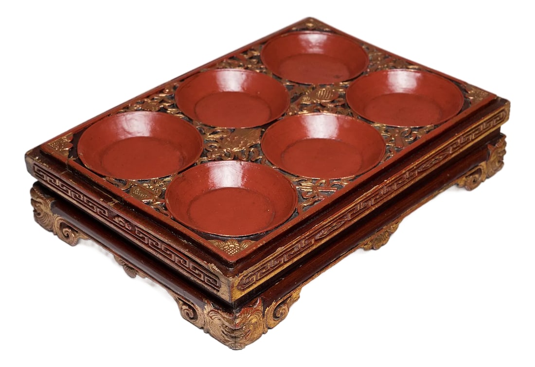 Chinese Eight Immortals Offering Tray, C. 1850: This ornately carved offering tray would have been presented as a gift filled with popular Chinese snacks, such roasted melon seeds, dried fruit, and soybeans toasted with cinnamon, fennel, and other