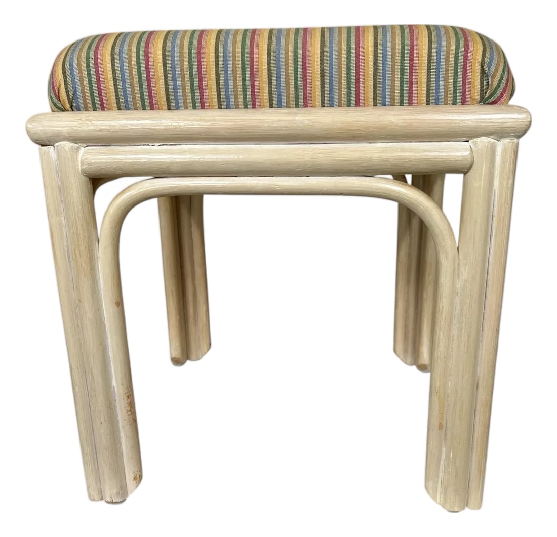 Vintage Rattan Ottoman: Vintage rattan ottoman in blonde finish. Striped cushion in green, pink, blue, and pale yellow. Measures 17.5" square x 19" h. Sturdy, no stains or tears. Condition: Alterations: Original Condition Un