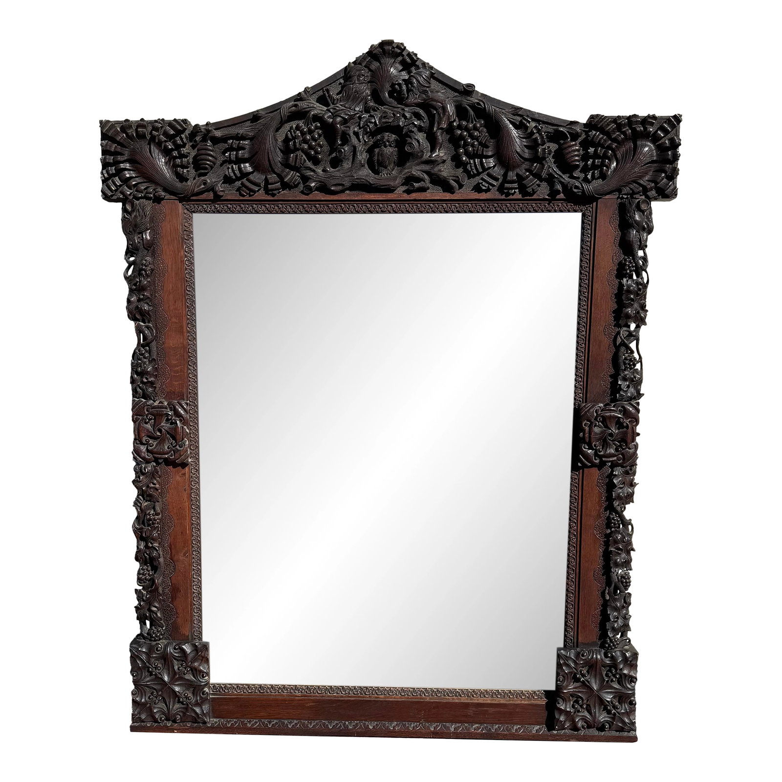Large Antique Hand-Carved Oak Black Forest Style Figural Wall Mirror: Exceptional large antique carved oak mirror featuring highly detailed hand-carved decoration throughout the frame. The monumental frame is richly sculpted with elaborate Black Forest–style
