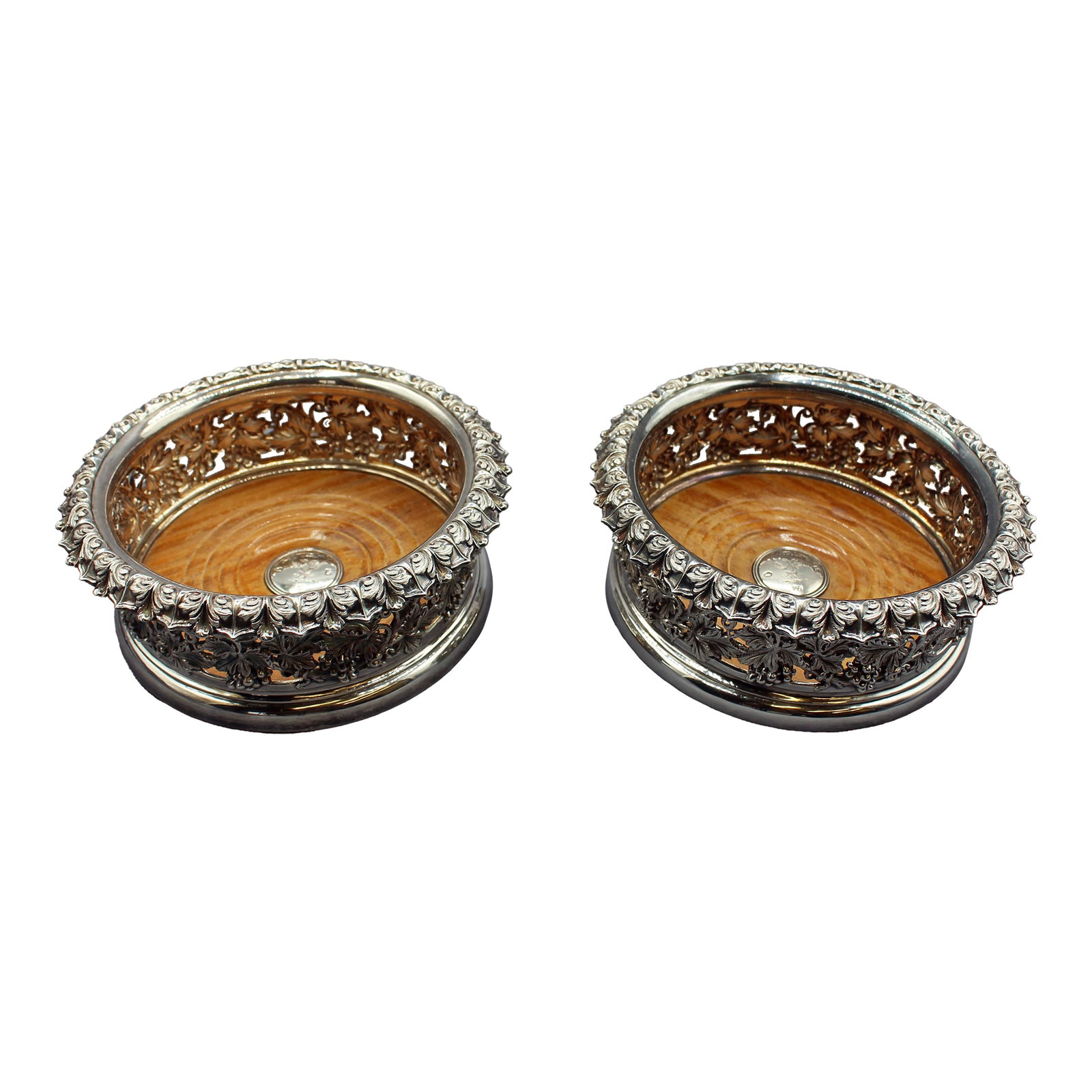 1839 Pair of Victorian Sterling Silver Wine Coasters by Samuel Walker & Co.: Pair of English Victorian Sterling Silver Wine Coasters, 1839 by Samuel Walker & Co., Sheffield. Bodies & crested buttons fully hallmarked. Ornate grape leaf borders set off the richly cast grape