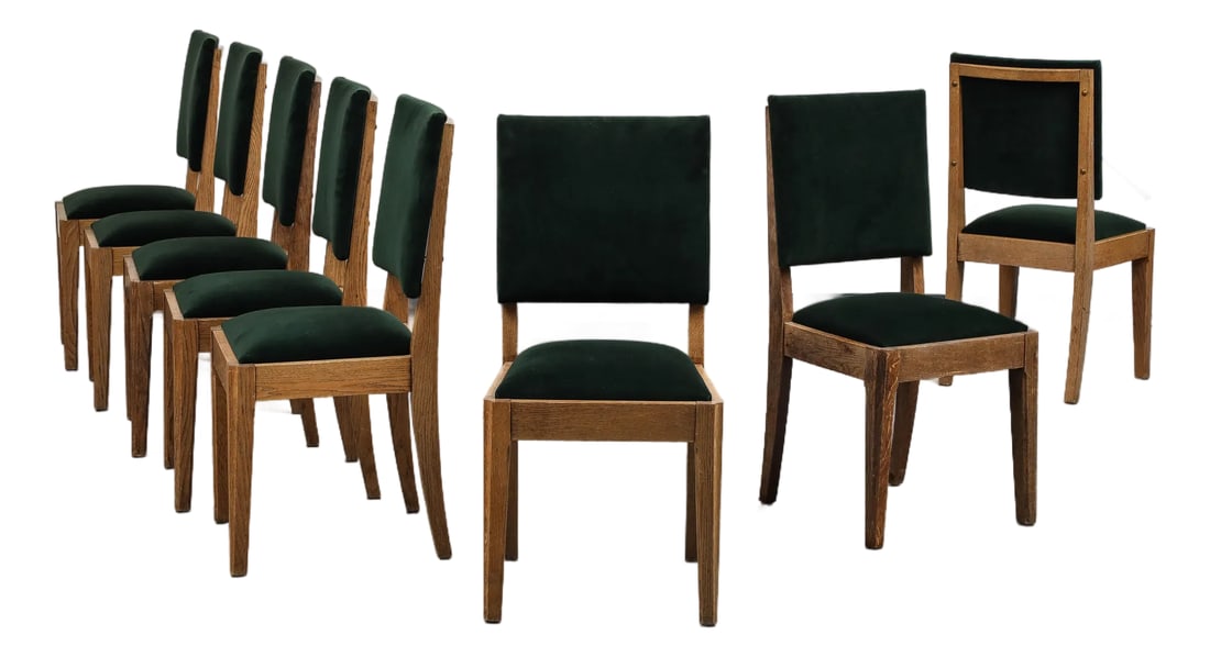 Set of Eight French Oak Dining Chairs in Forest Green Cotton Velvet, C. 1945: Set of eight (8) midcentury French oak cerused oak dining chairs, c. 1945. The seats and backs have been newly upholstered in forest green cotton velvet. The front legs are straight tapered, while the
