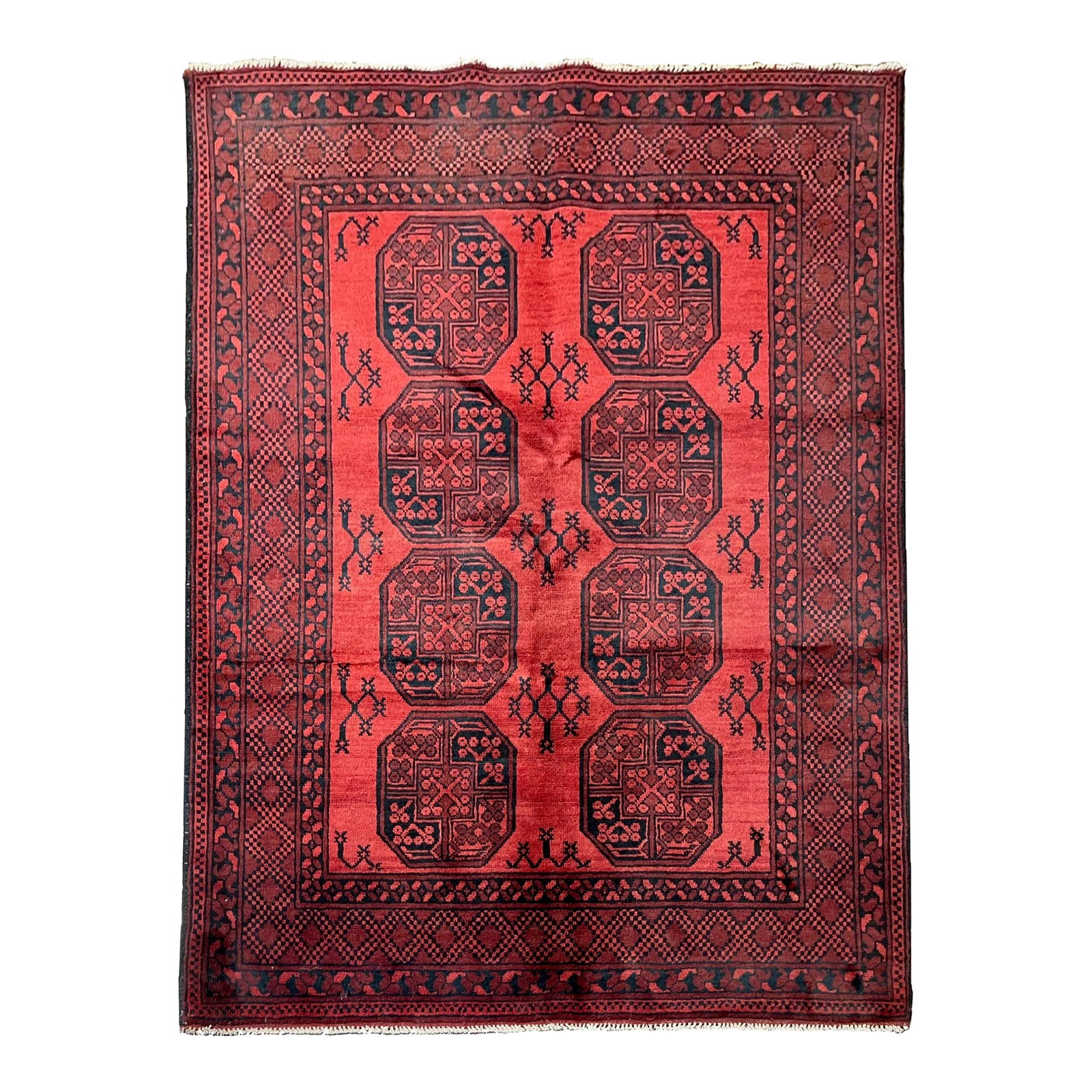 Vintage Afghan Hand-Knotted Rug 4'11" X 6'7": Vintage Hand-knotted Afghan Khal Mohammadi rug with eight geometric guls on a red field and dark navy details. Multiple tribal borders frame the design. Known for its deep red tones. Wool pile with a 