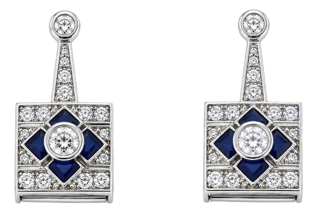 Mid 20th Century Pair of 18k White Gold Diamond Sapphire Earrings: 18k White Gold Diamond and Sapphire Earrings Earrings featuring round white diamonds and square blue sapphires. Crafted in 18k white gold. Total weight: 3.66g. Condition: Alterations: Original Conditi