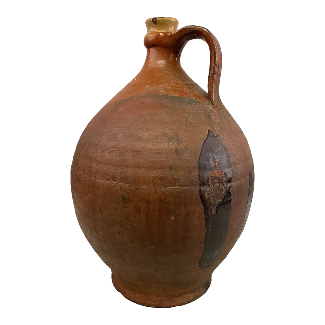 Early 19th Century French Terracotta Water Jug: A French Terracotta Pottery Water Jug with some glazing near the top. Great color and it weighs 9 Lbs. Dimensions are 15" high by 10" diameter. Circa 1820-1840. In Good condition with some chips at
