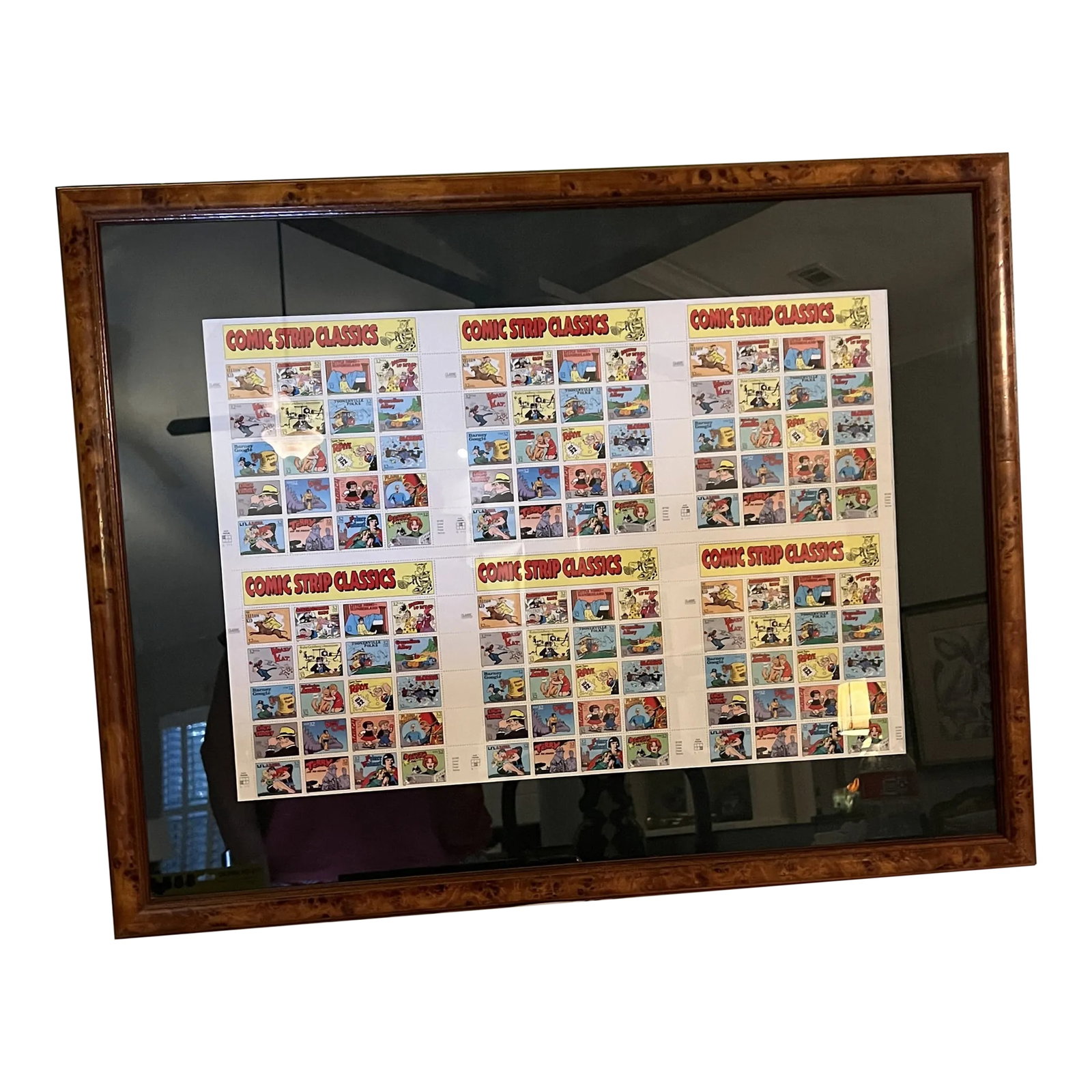 1995 Framed Comic Strip Classics Stamps 6 Mint Sheets: Six mint sheets of Comic Book Classics stamps from the USPS. These colorful stamps are framed in a burl wood frame and matted. The stamps are protected in corner mounts within the frame. Unique piece 
