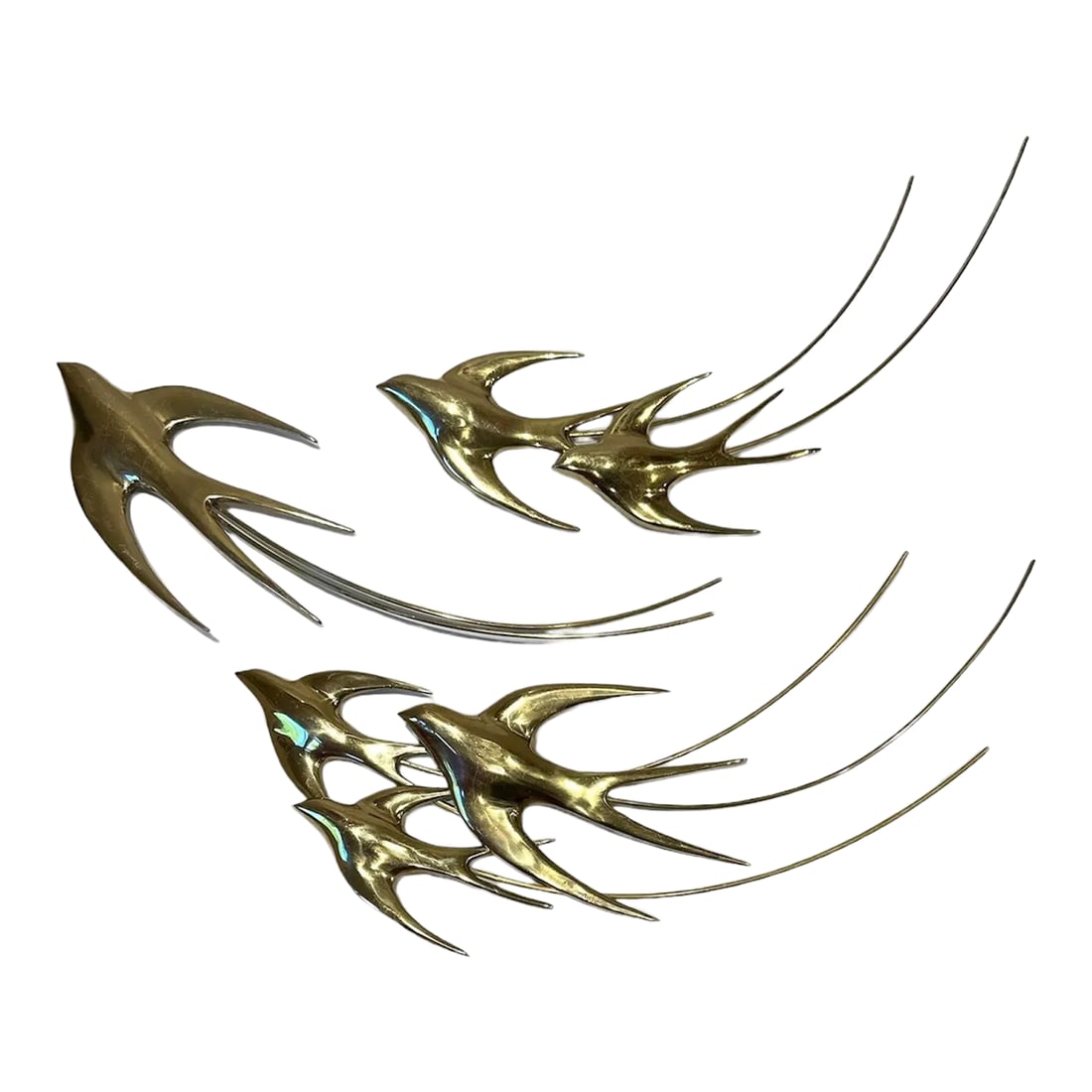 Brass Wall Sculpture Birds in Flight Bijan 1980- Set of 3 Decor: Extremely agile and frequently flying, swallows are commonly associated with spring and summer. Since their migration completes with winter's end they are felt to bring forth the new, and colorful