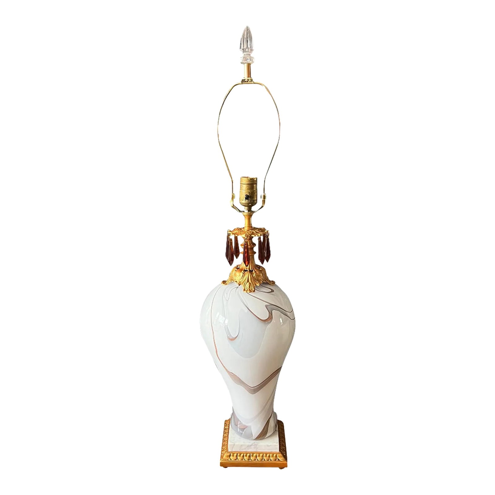 Art Glass White Smoke Swirl Table Lamp: This distinctive lamp seamlessly merges Art Glass and mid-century brass into a captivating design. Its bulbous body, hand-blown from white glass, features a delicate grayish taupe swirl that adds an e