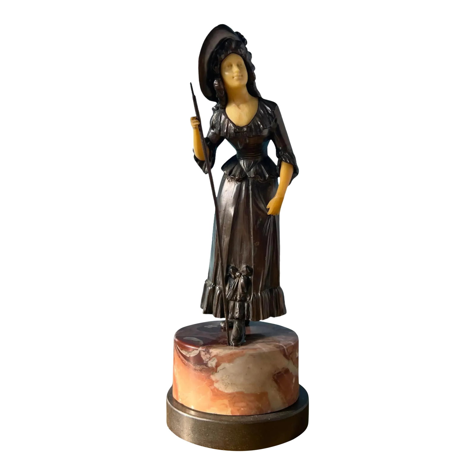 Antique Ivorine Spelter Sculpture: Shepherdess on Marble Plinth: This exquisite antique sculpture beautifully captures the image of a shepherdess tenderly looking after her flock of sheep. Standing at nearly 12 inches tall, the figure is a stunning blend of craftsm