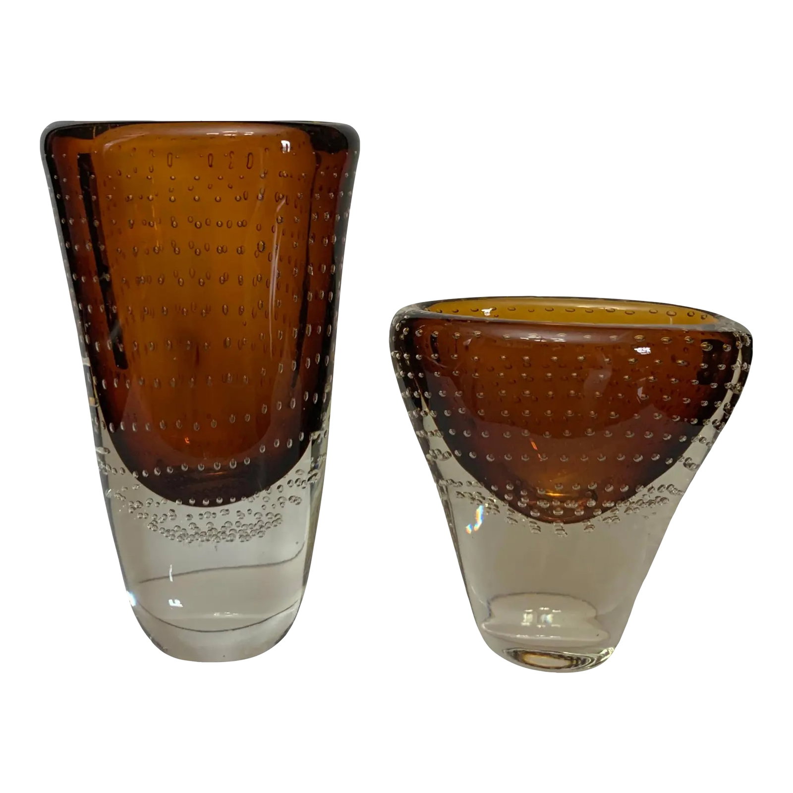 Murano Art Glass Sommerso Bullicante Amber Vases - a Pair: These exquisite hand-shaped vases are crafted from rich amber and crystal-clear glass using a combination of advanced glassblowing techniques. Both vases feature an elegant cone shape, with one standi