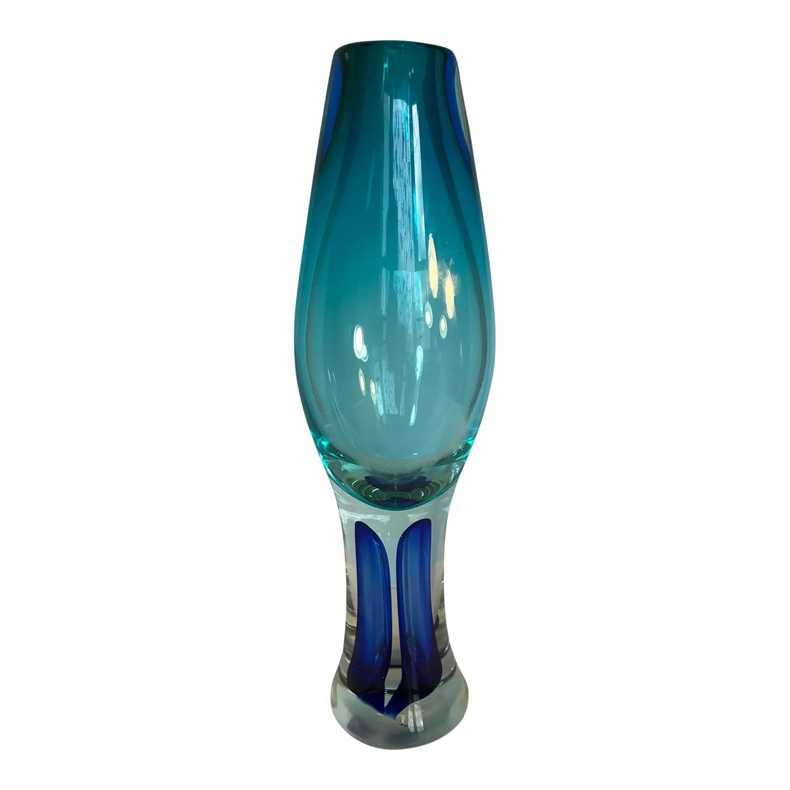 Blue Goblet Shaped Sommerso Art Glass Vase: This breathtaking 16-inch-tall Art Glass vase is a true masterpiece, meticulously hand-blown by skilled artisans using a harmonious blend of teal, clear, and blue glass. Crafted with the traditional