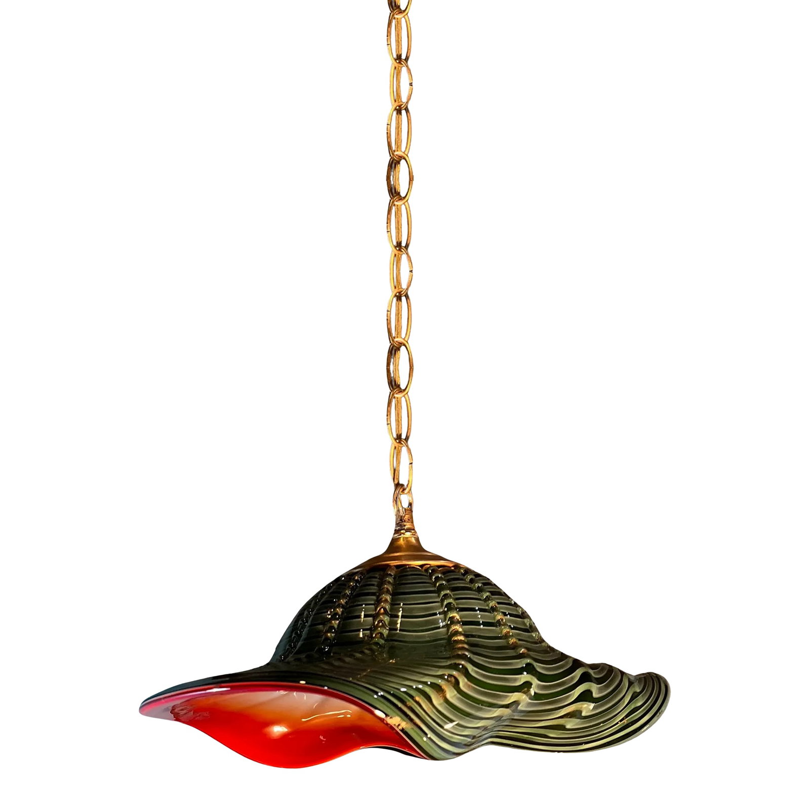 Murano Art Glass Undulating Loosely Furled Green Swirled Pendant Light: One-of-a-Kind Murano Art Glass Pendant Lamp with Vintage Brass Accents This extraordinary pendant lamp is a fusion of timeless elegance and artistic craftsmanship, featuring an exquisite handblown