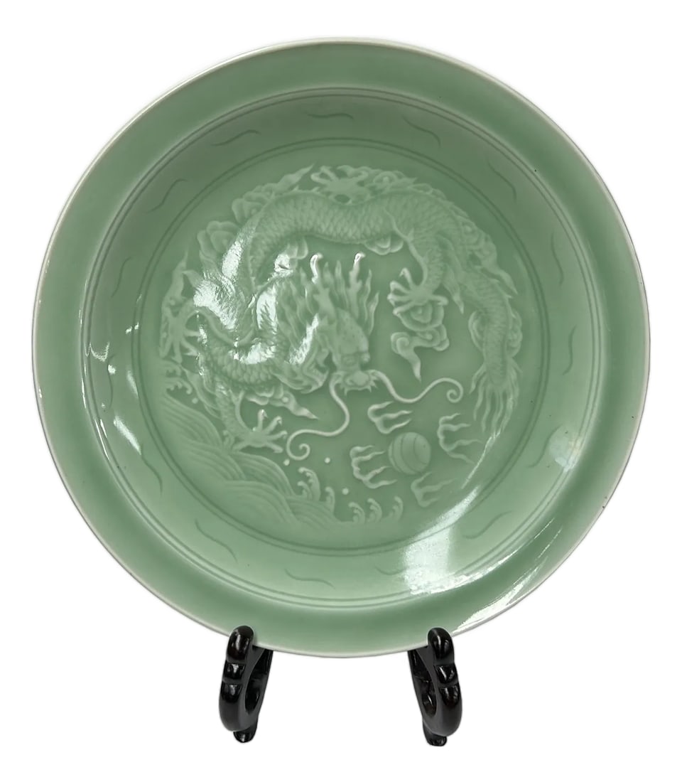 Chinese Celadon Dragon Motif Porcelain Plate Display Art: Immerse yourself in rich cultural heritage with this stunning celadon plate, featuring a powerful and auspicious dragon. In many Asian cultures, the dragon symbolizes strength, good fortune, and