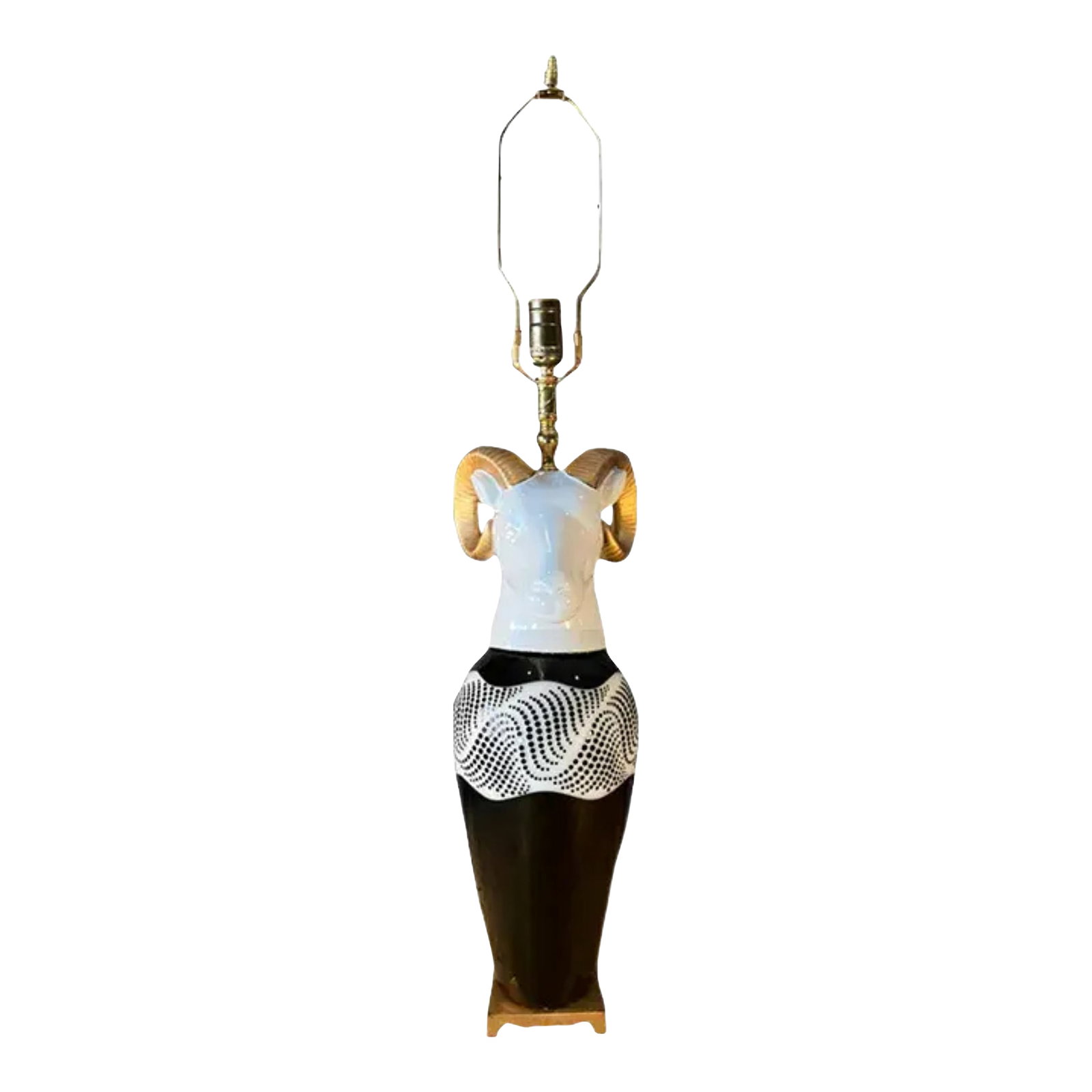 Modern Rams Head Table Lamp With Graphic Textural Design: This striking table lamp combines animal form and modern artistry in a sculptural design that commands attention. At its peak, the ram's head"”crafted from glossy white porcelain"”emerges