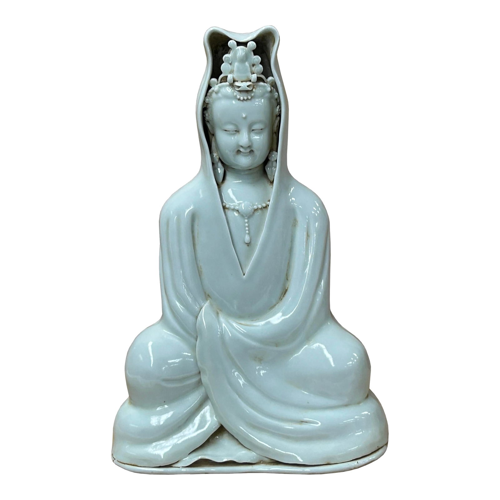 Dehua Blanc De Chine White GuanYin Bodhisattva Porcelain Statue: Embrace tranquility with this captivating Dehua Blanc de Chine porcelain statue depicting Guanyin, the Buddhist Bodhisattva of Compassion. Crafted with a luminous, creamy white glaze, the figure is
