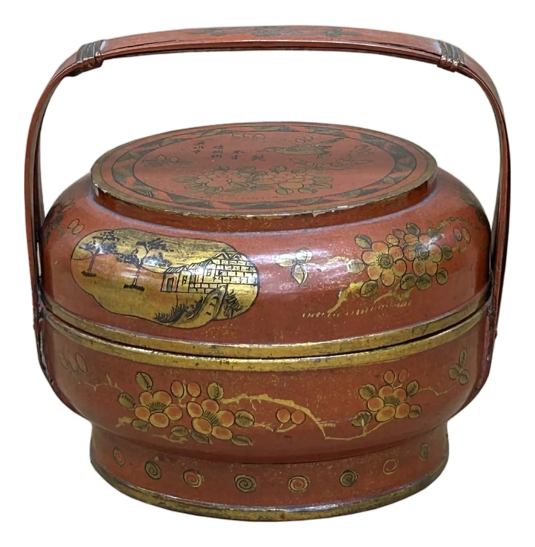Vintage Oriental Brick Red Golden Graphic Stack Wedding Basket Display: This is a two-tiered antique Chinese wedding basket (known as a tinghe or food box) crafted from wood and coated in a rich, warm red lacquer. The basket features elaborate hand-painted decoration in