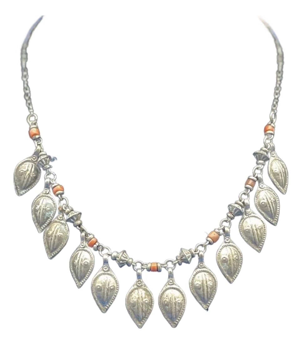 Antique Turkmen / Yemen Tribal Silver Keaf Necklace, Coral Accents.: Delicate antique Middle Eastern Necklace. Charms are leaf shaped with a Repousse design, each are similar. Small bead coral accents this piece with a pop of color. Unique find. Pictures show you each