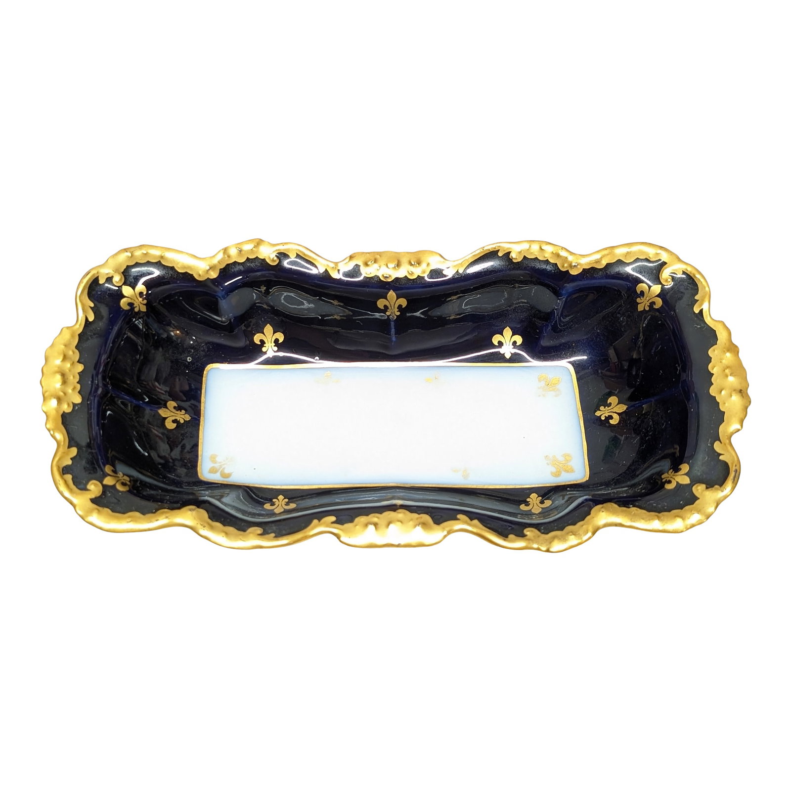 Late 19th Century J. Pouyat Limoges Porcelain Fleur De Lis Royal Blue & Gold Gilt Tray: Royal velvet blue and thick gold gilt on soft paste porcelain tray. Some of the hand painted Fleur de Lis are wearing off on the bottom (see photos) Marked J.P over L., indicating that the white