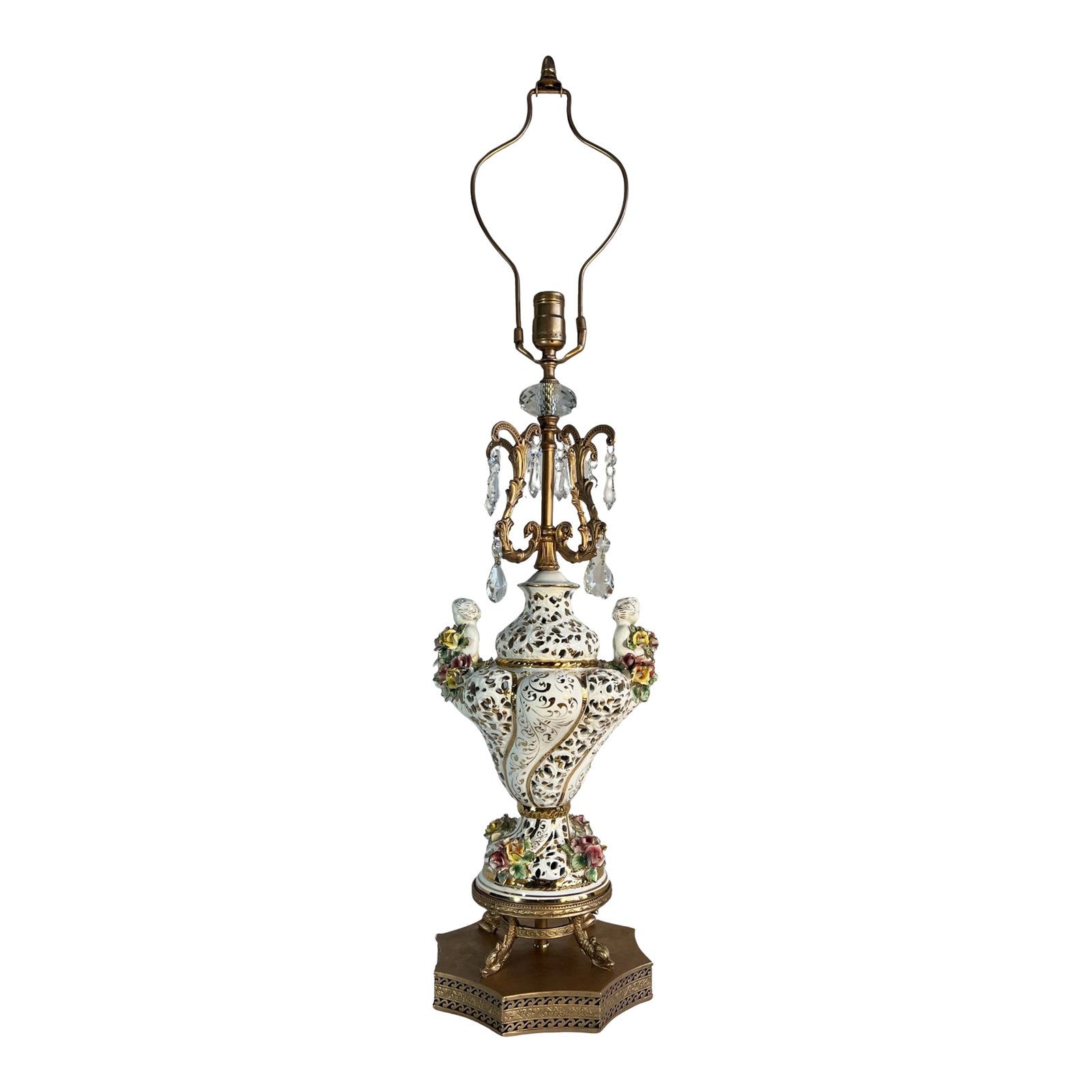 Capodimonte Porcelain Cherub Floral Lamp With Crystal Prisms: This striking one-of-a-kind 36-inch table lamp was designed using Capodimonte porcelain vintage lamp components combined with scrolled metal arms with crystal accents. The creamy white porcelain body