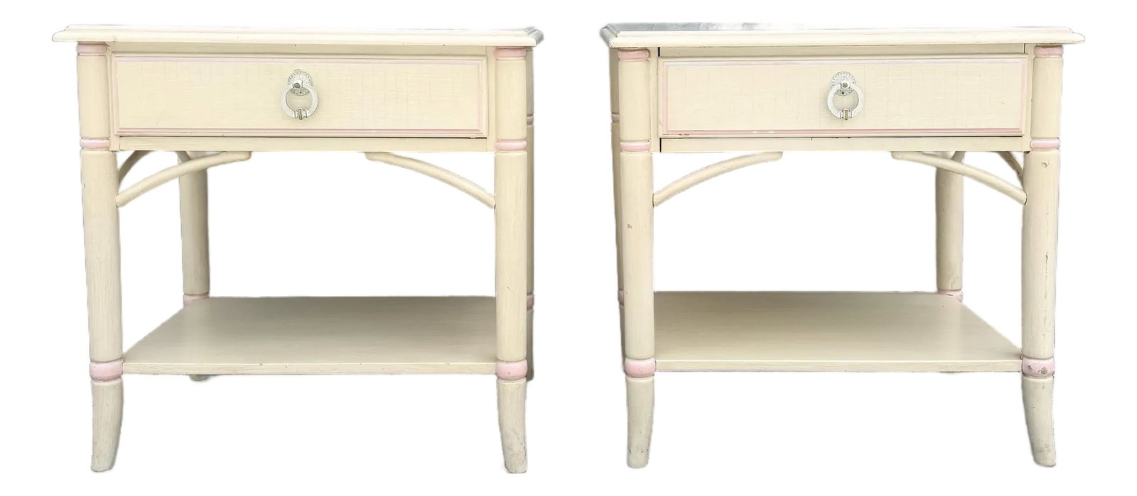 Vintage Coastal Faux Bamboo Cream and Pink Nightstands by Thomasville - A Pair: A charming pair of vintage Thomasville nightstands, beautifully designed in a soft coastal palette of creamy ivory with delicate blush pink accents. Featuring faux bamboo-inspired legs, raffia-style