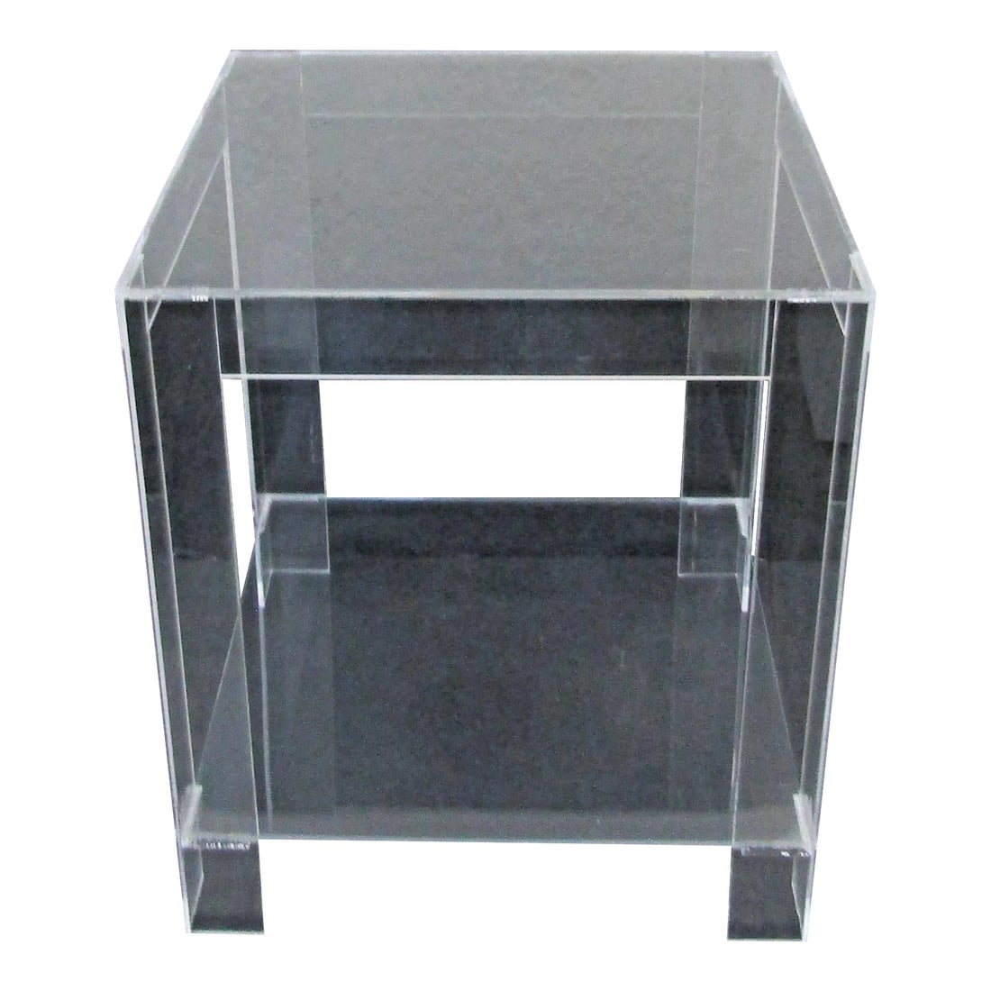 MCM Hollywood Regency Clear Lucite Acrylic Two-Tier Square Side Table: The MCM Hollywood Regency Clear Lucite Acrylic Two-Tier Square Side Table is a vintage piece of furniture that exudes Hollywood glamour. With its sleek square shape and clear acrylic construction, thi