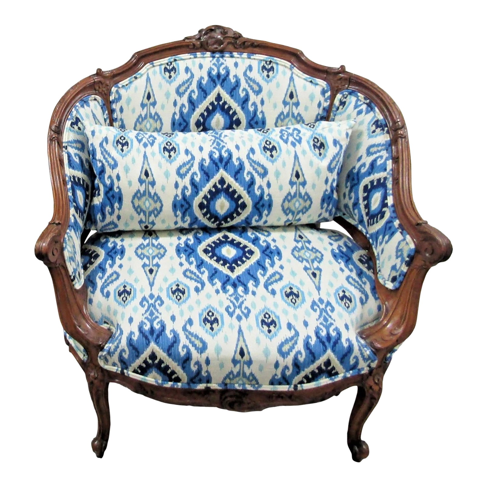 Antique French Louis XV Carved Walnut French Bergère Armchair Ikat 18th Century: This Antique French Louis XV Carved Walnut French Bergère Armchair from the 18th century is a stunning piece of vintage furniture. Handmade in France with intricate carvings and double ikat