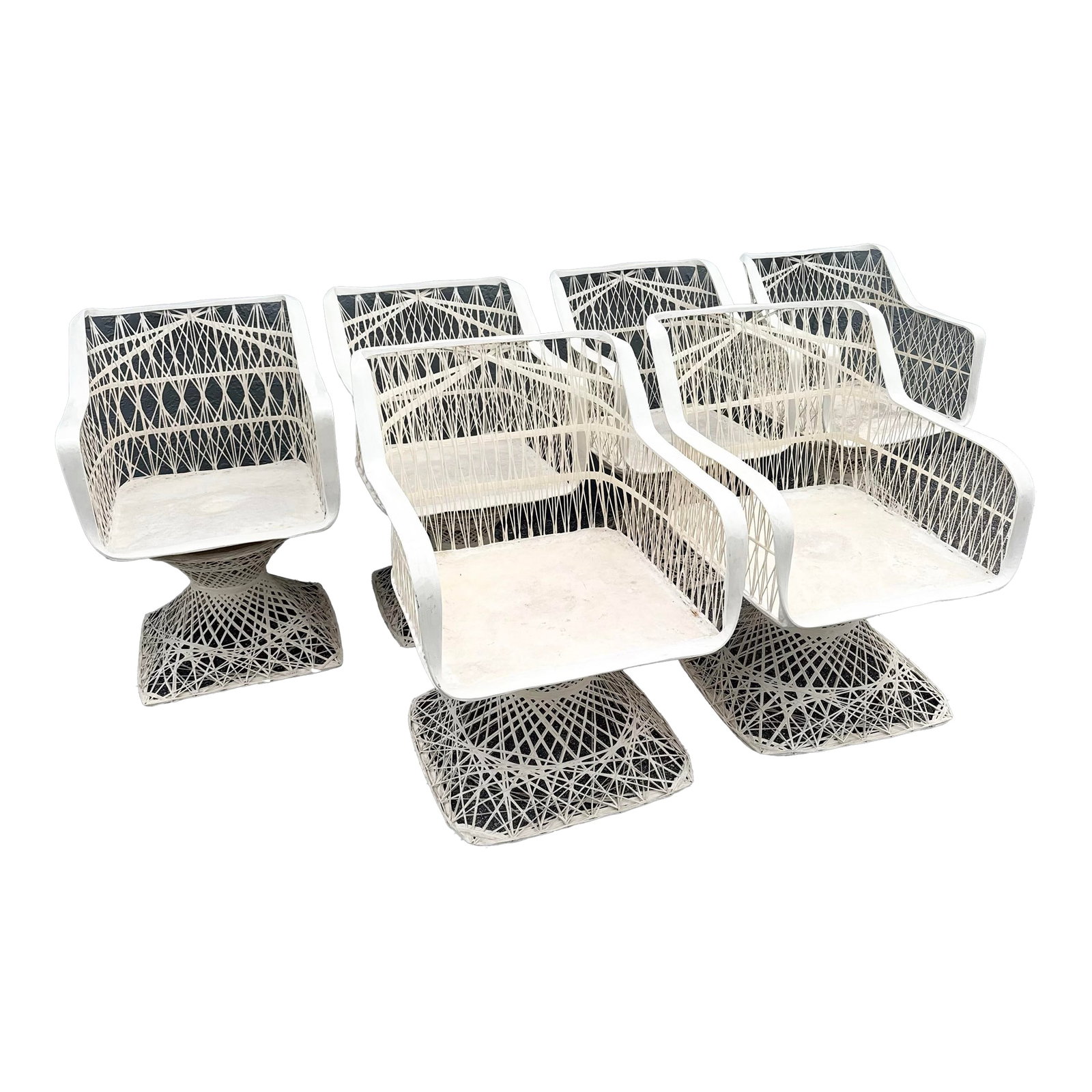 Mid Century Modern Spun Fiberglass Swivel Dining Arm Chairs - Set of 6: Larger chair: 26"w, 32"d, 32"h. A striking set of Mid Century Modern spun fiberglass swivel dining armchairs featuring an airy sculptural silhouette and intricate woven fiberglass construction. The