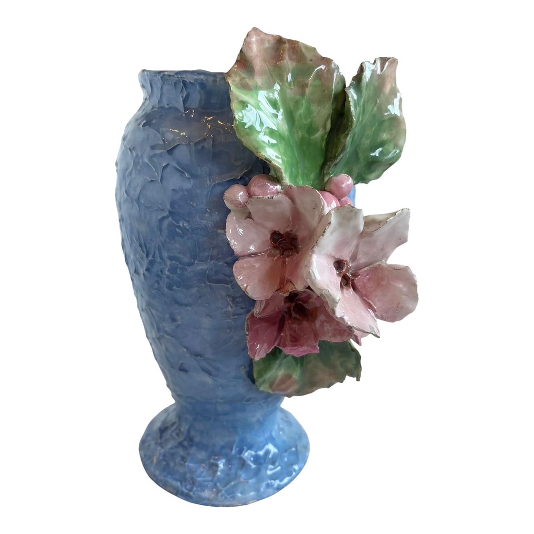 Barbotine Majolica Floral Vase: A charming mid century Barbotine majolica vase, beautifully decorated with hand modeled flowers, berries, and lush foliage in vibrant pastel hues. The textured blue ground provides a striking