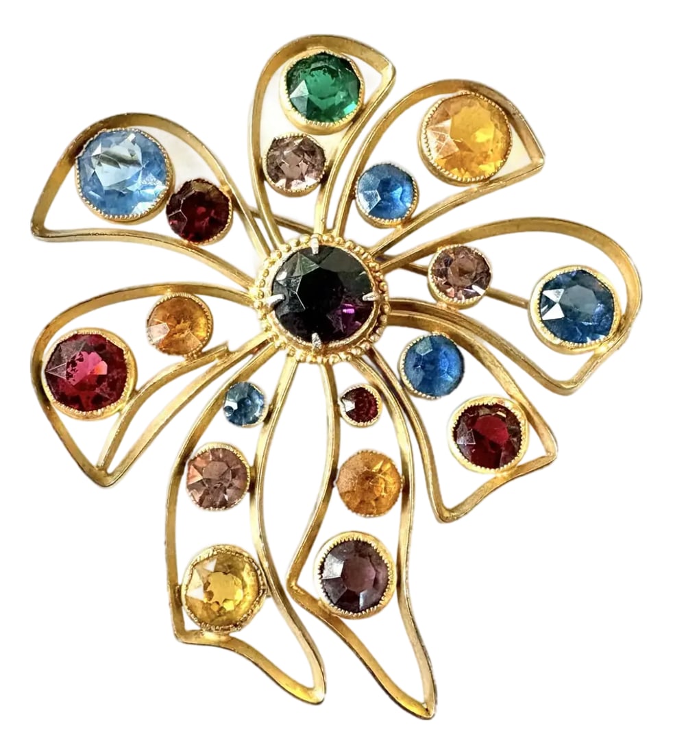 Vintage Gold Fill Rhinestone Brooch: Stunning vintage gold fill rhinestone brooch with multi colored rhinestones included ruby, amethyst, aqua marine, emerald, peridot colored rhinestones. Condition: Alterations: Original Condition